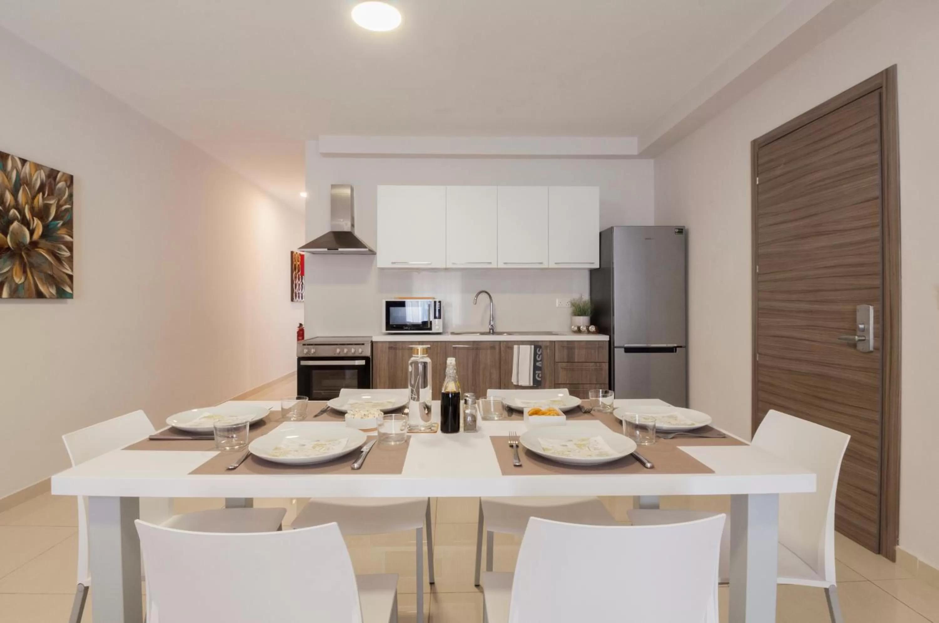 Dining area in Blubay Apartments by ST Hotels