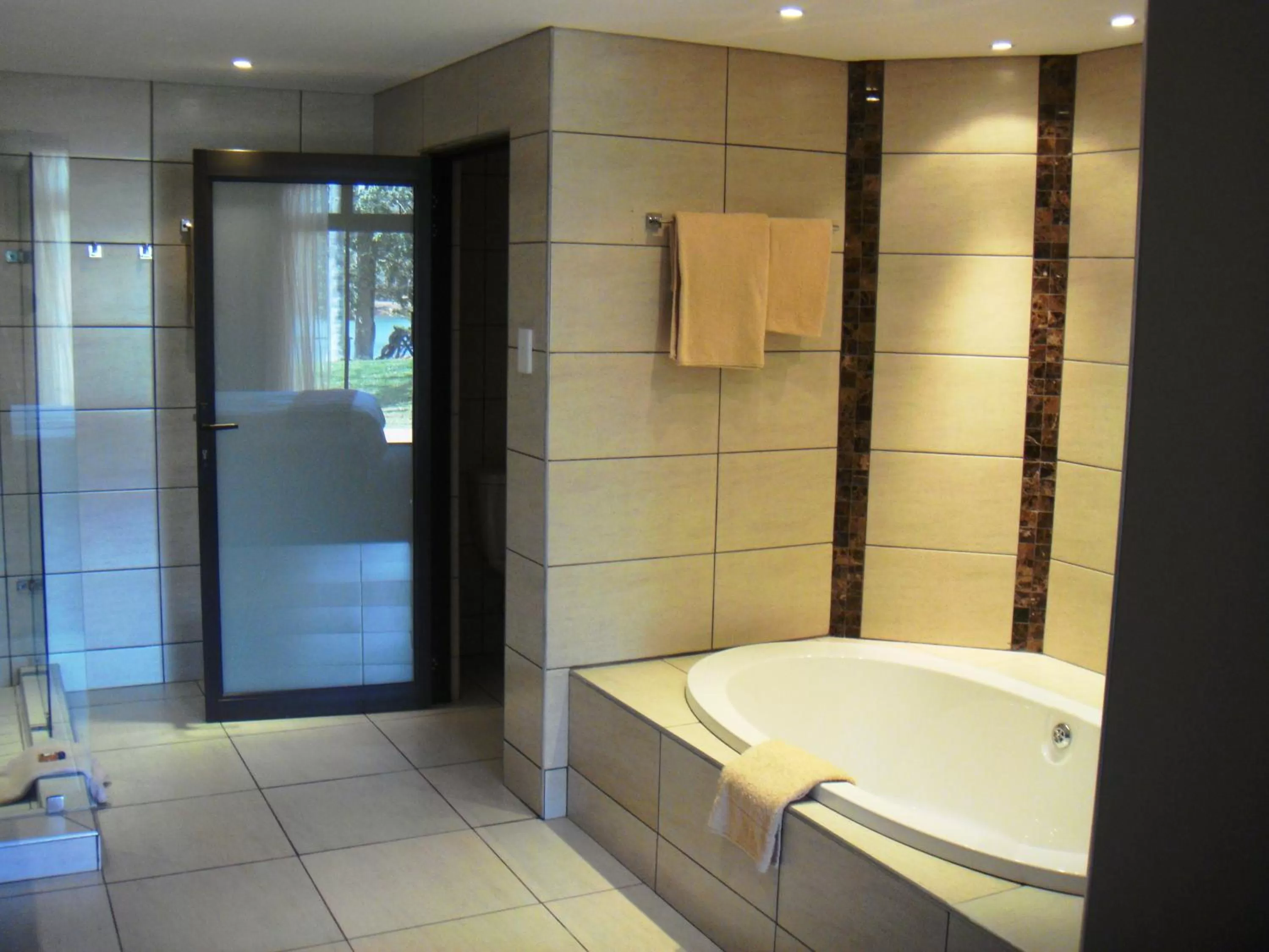 Bathroom in African Sky Hotels - Pine Lake Inn