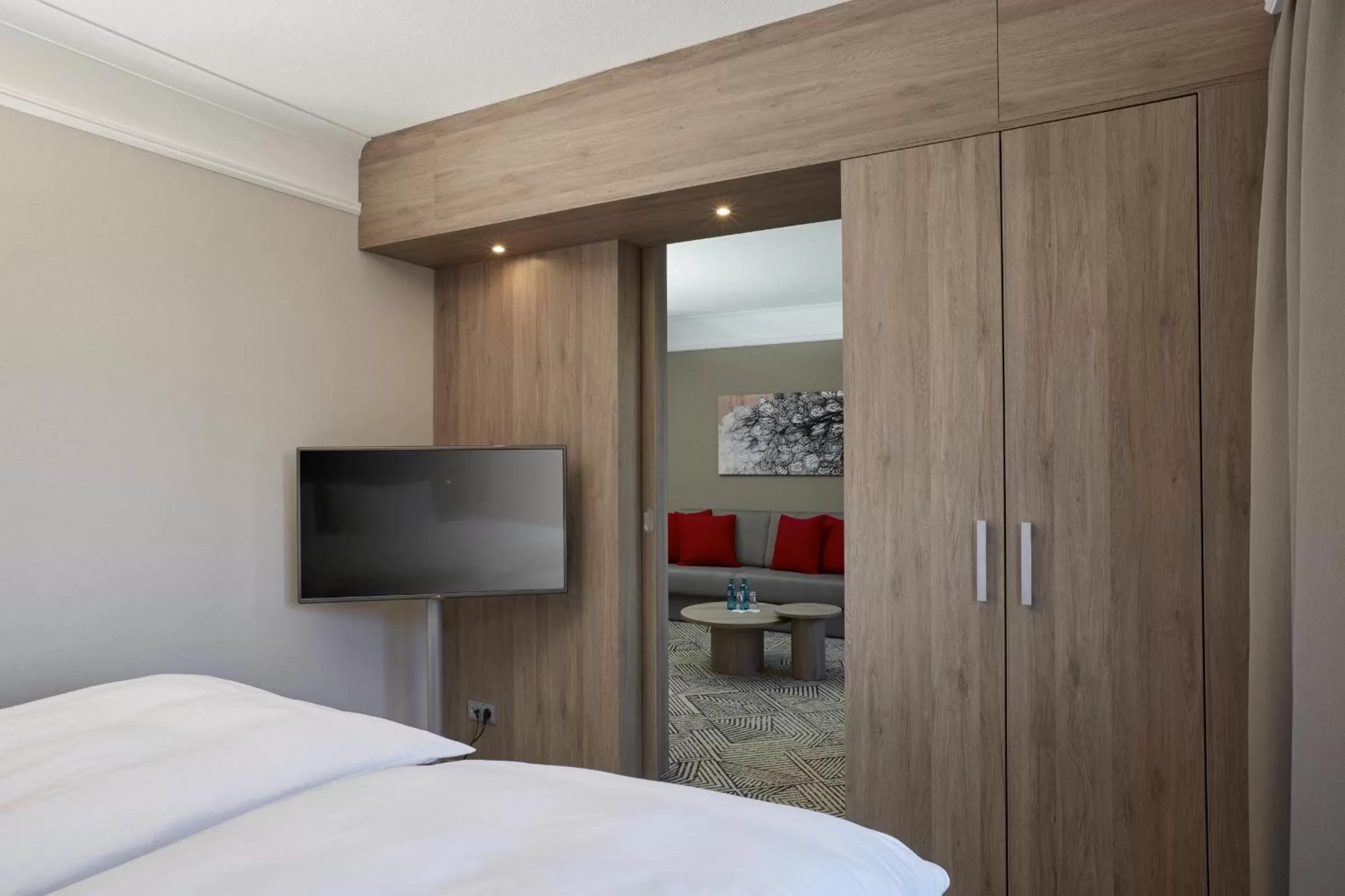 Photo of the whole room, Bed in H4 Hotel Hannover Messe, Trademark Collection by Wyndham