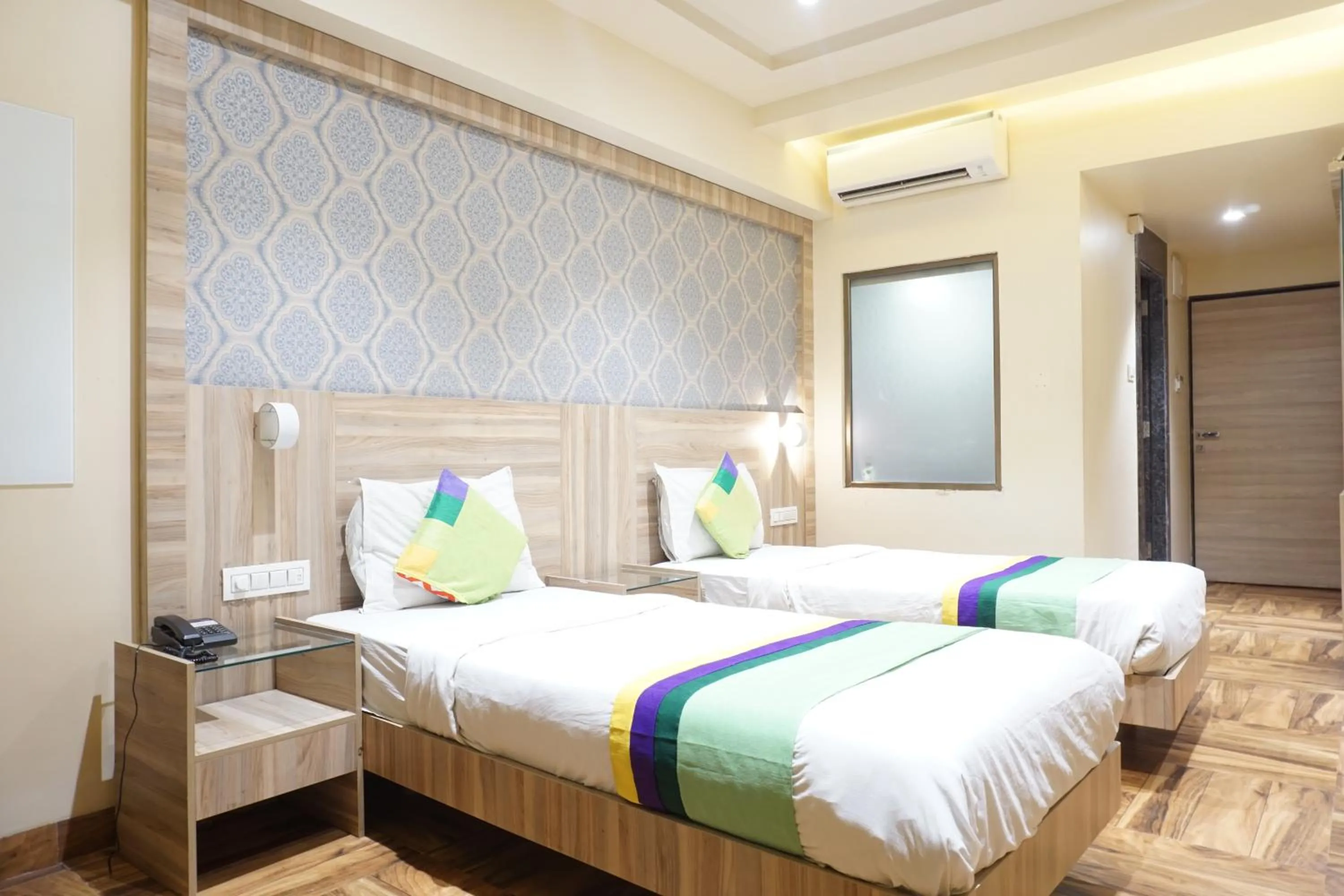 Bedroom, Bed in Treebo Classic Grande, Camp