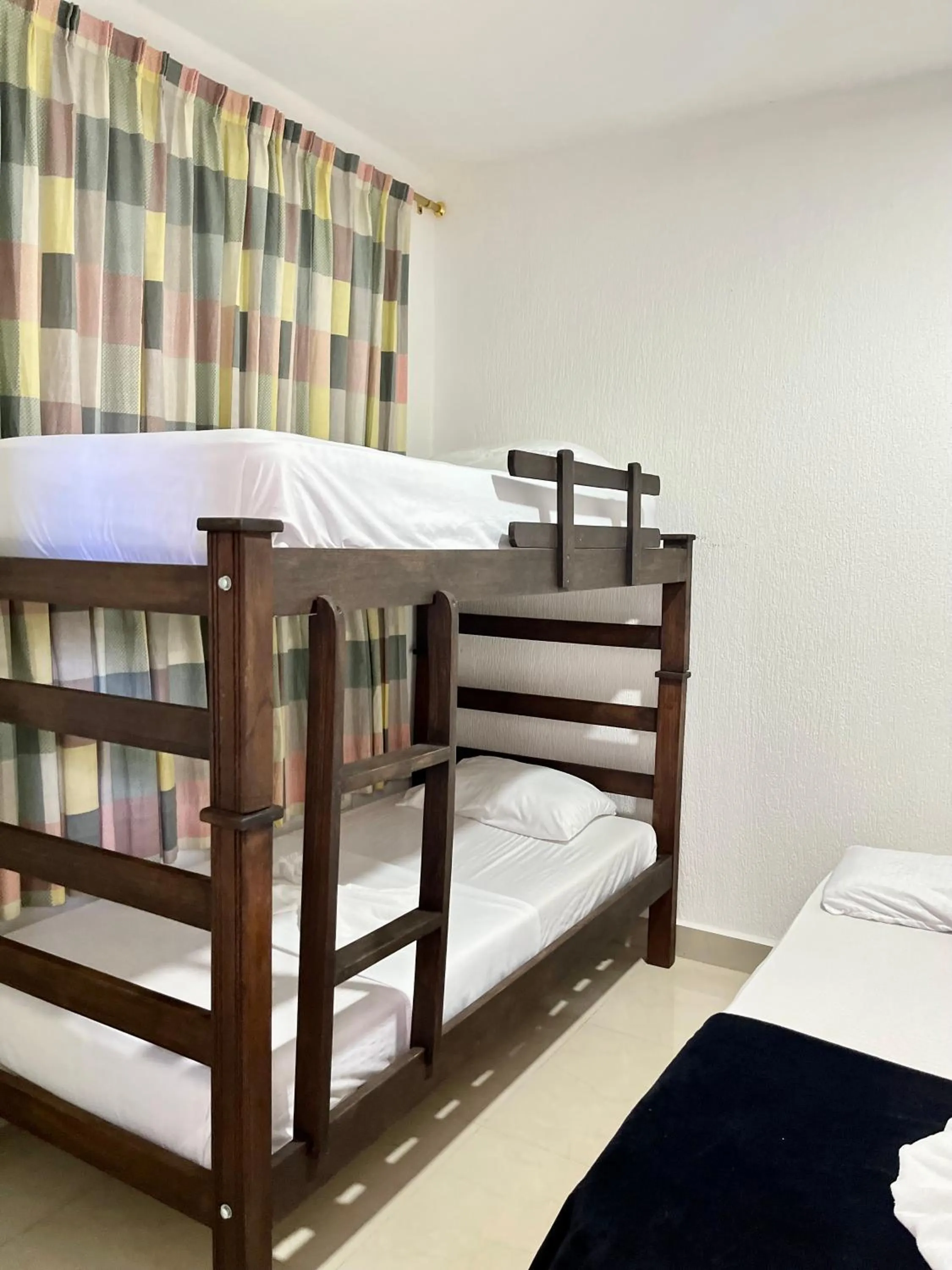 Bed in Hotel Colonial Plaza