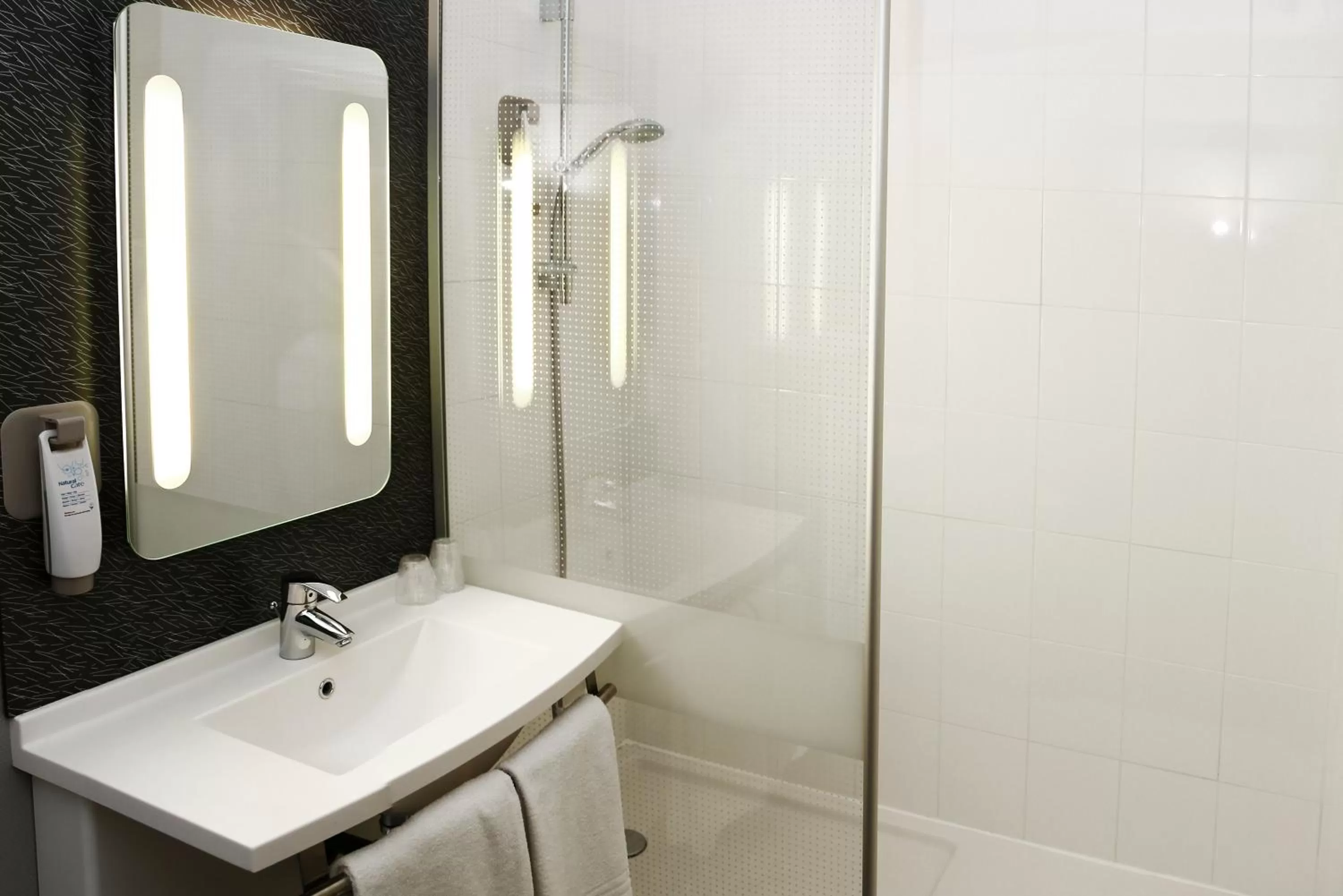 Bathroom in ibis Orange Centre Echangeur A7 A9