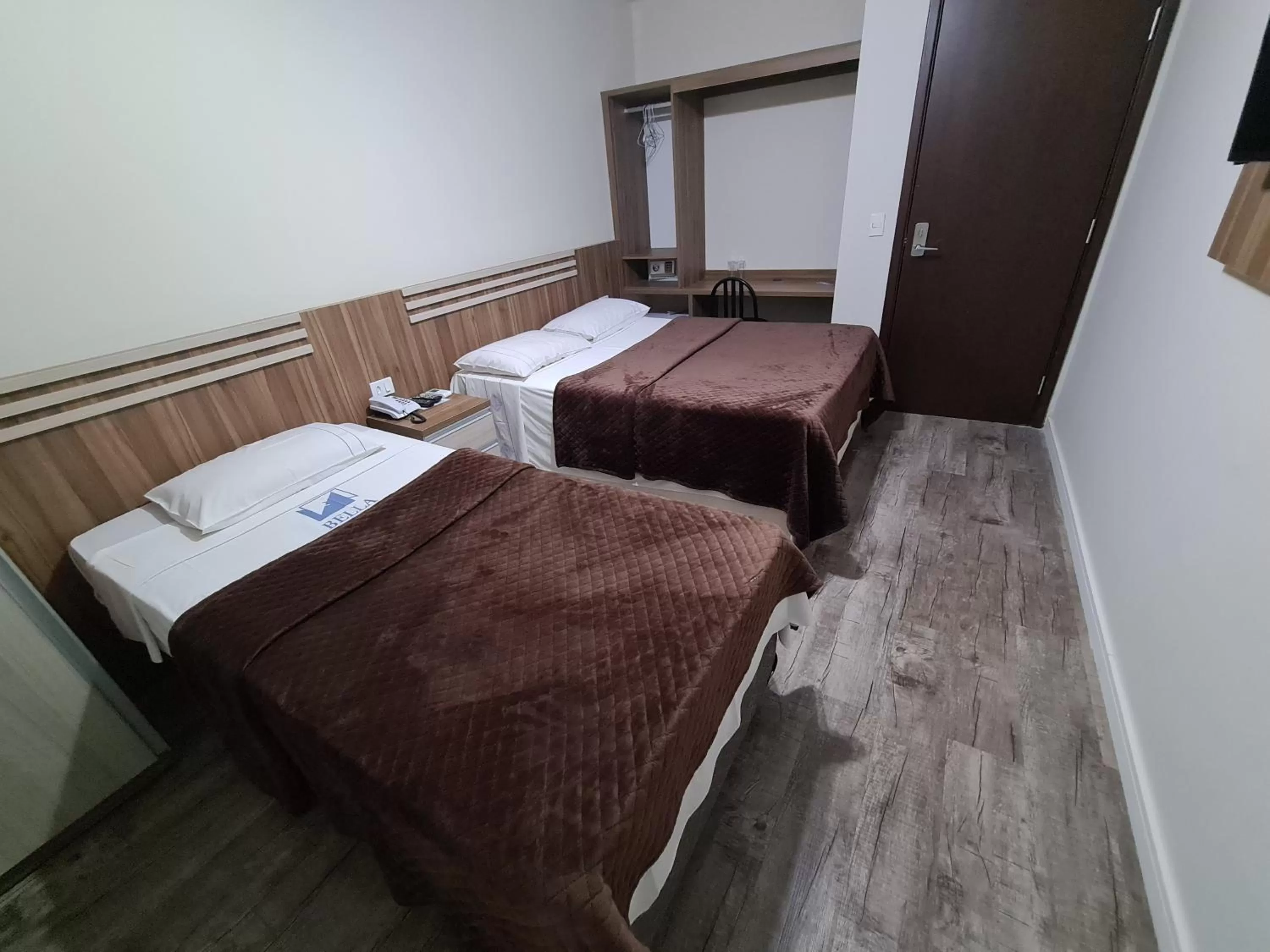 Bed in Bella Augusta Hotel