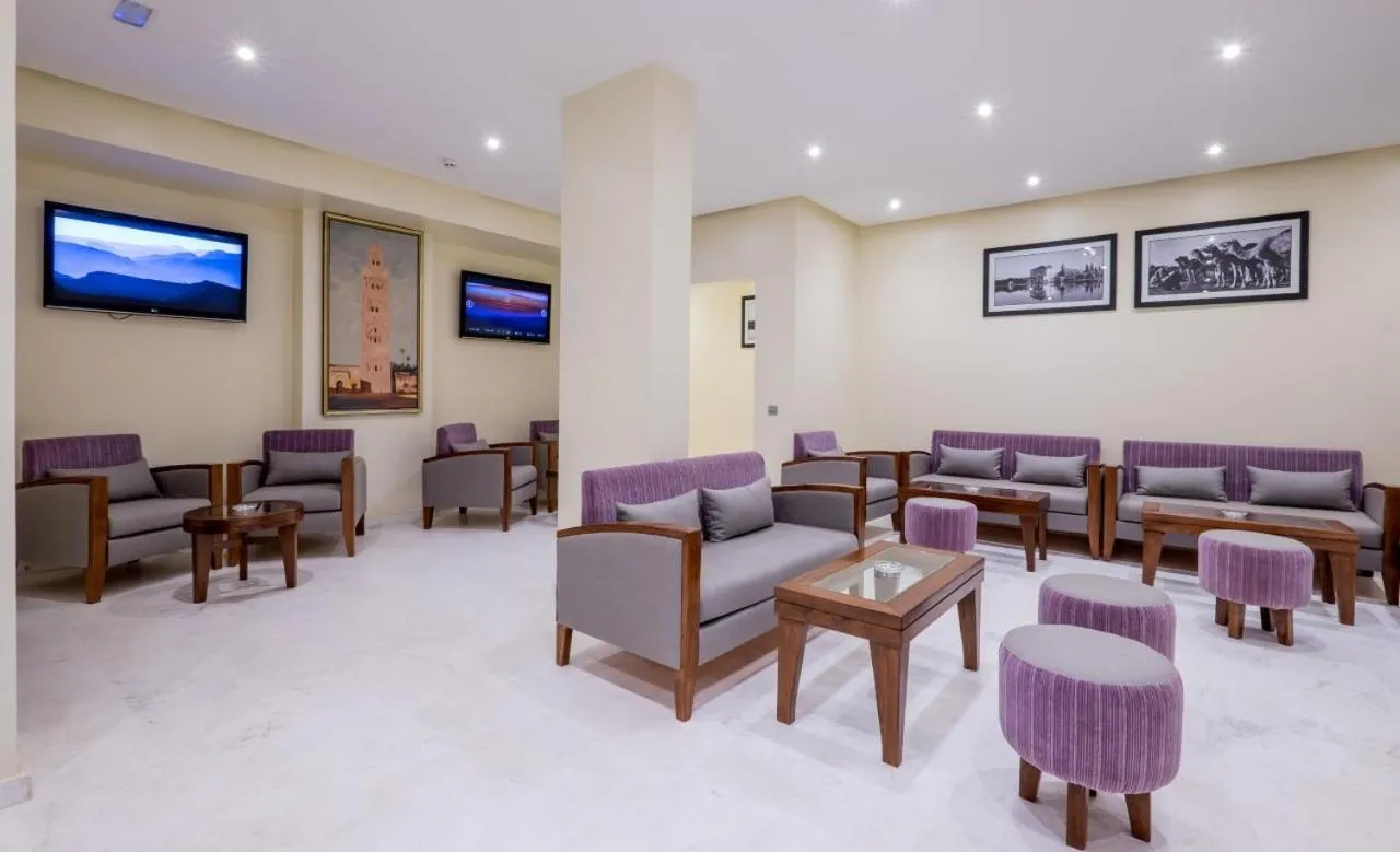 Communal lounge/ TV room in Hotel Ayoub & Spa