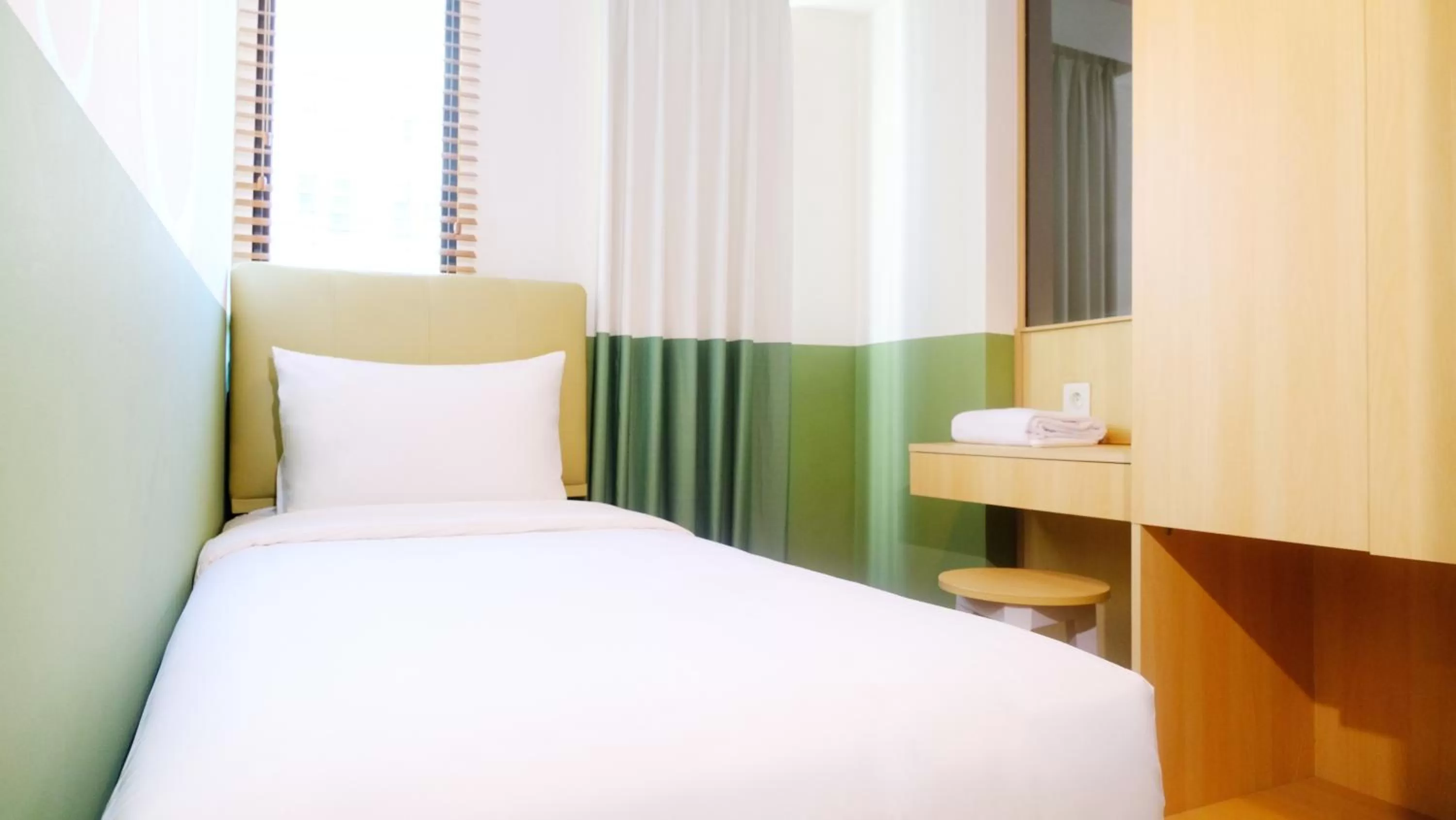 Bed in Hotel Osaka PIK2