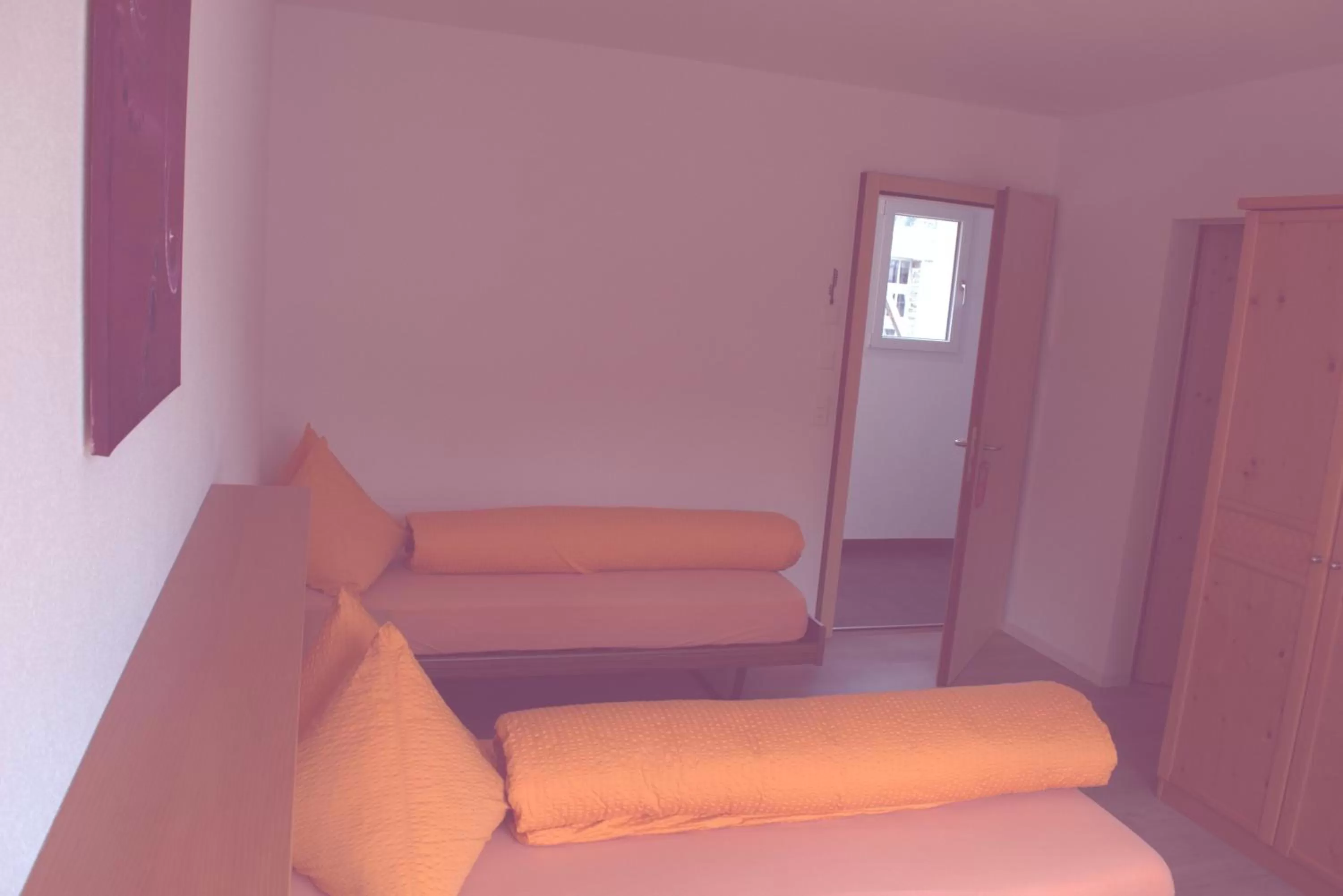 Bed, Seating Area in Ristorante Pensione Chalet Stazione