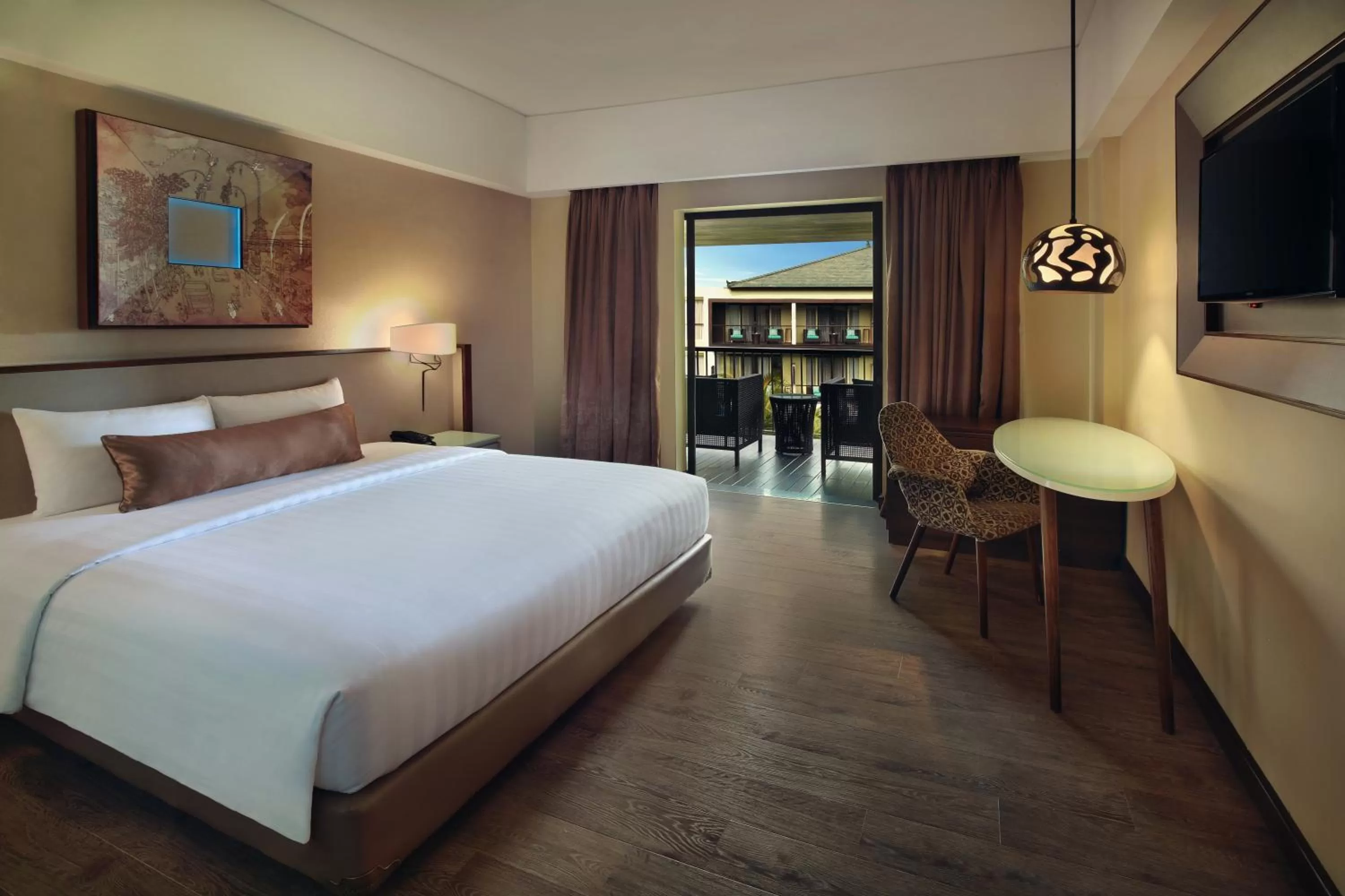 Seating area, Bed in Mercure Bali Legian