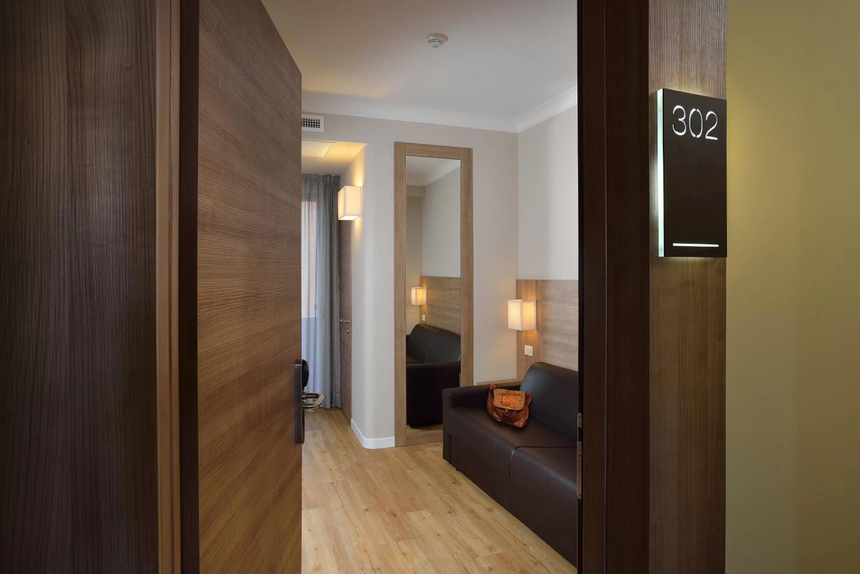 Photo of the whole room, Bed in Hotel Rossini