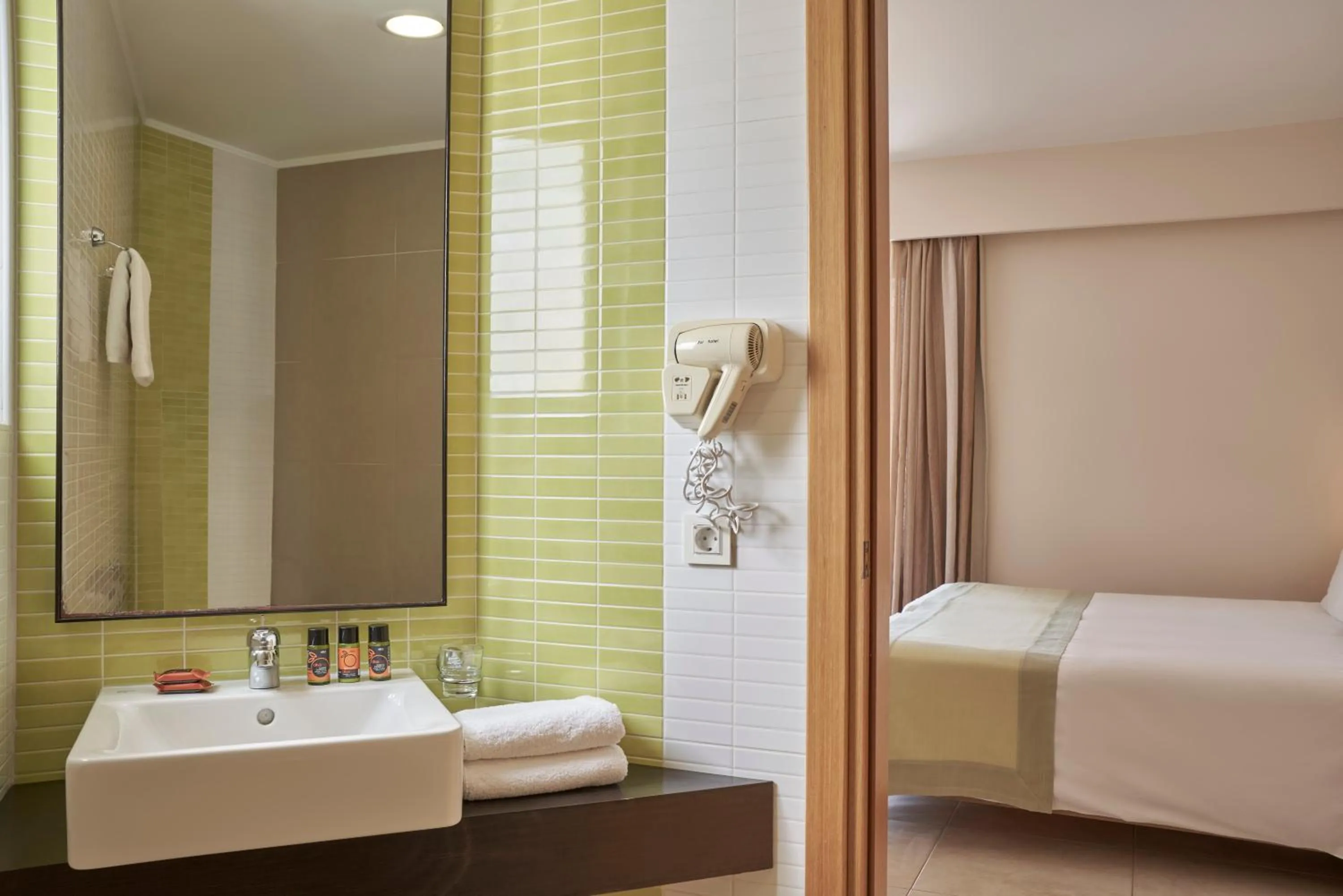 Bathroom, Bed in Atlantica Amalthia Beach Hotel - Adults Only
