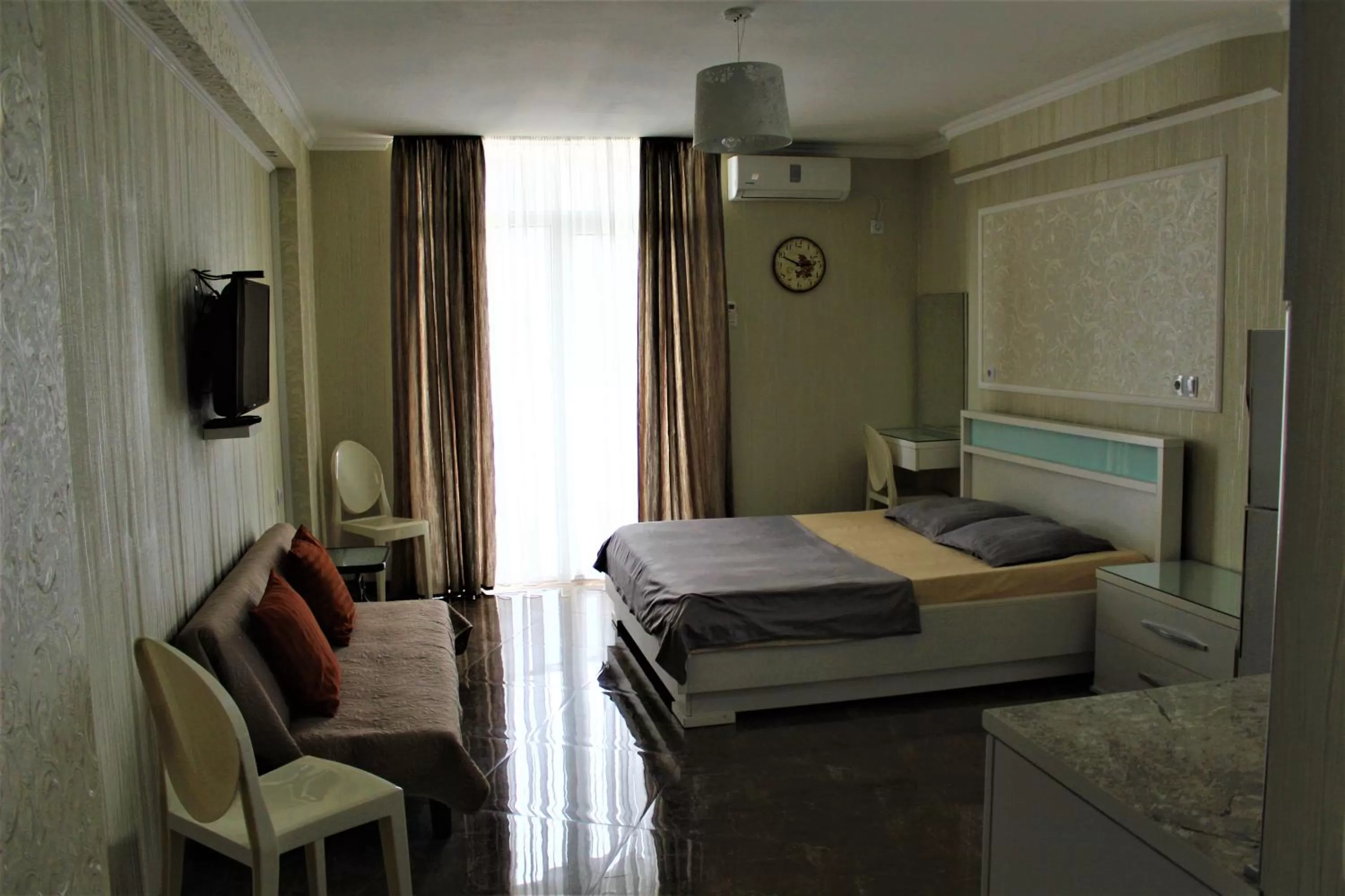 Bed in Orbi Lux Apartment