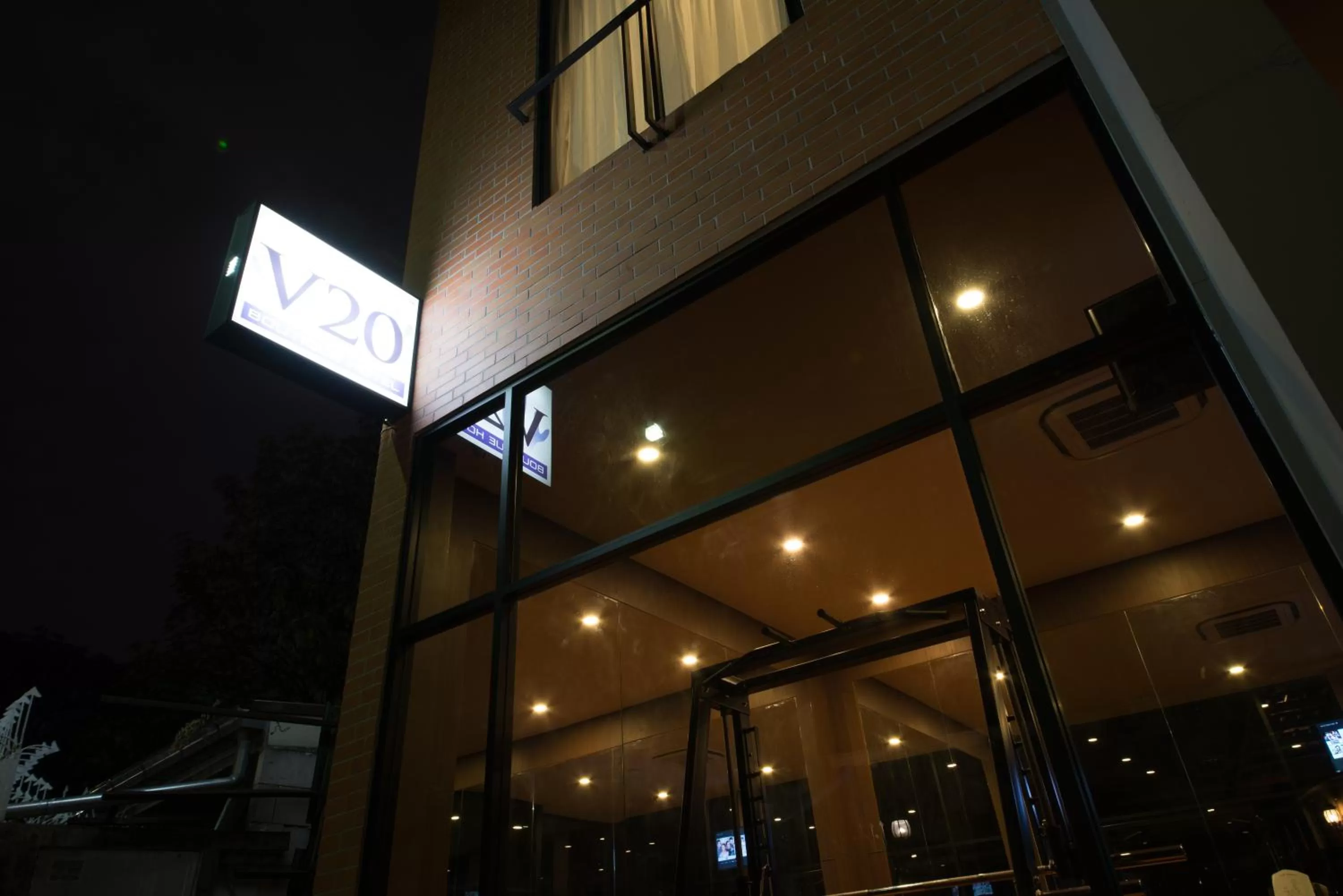 Property logo or sign in V20 Boutique Jacuzzi Hotel