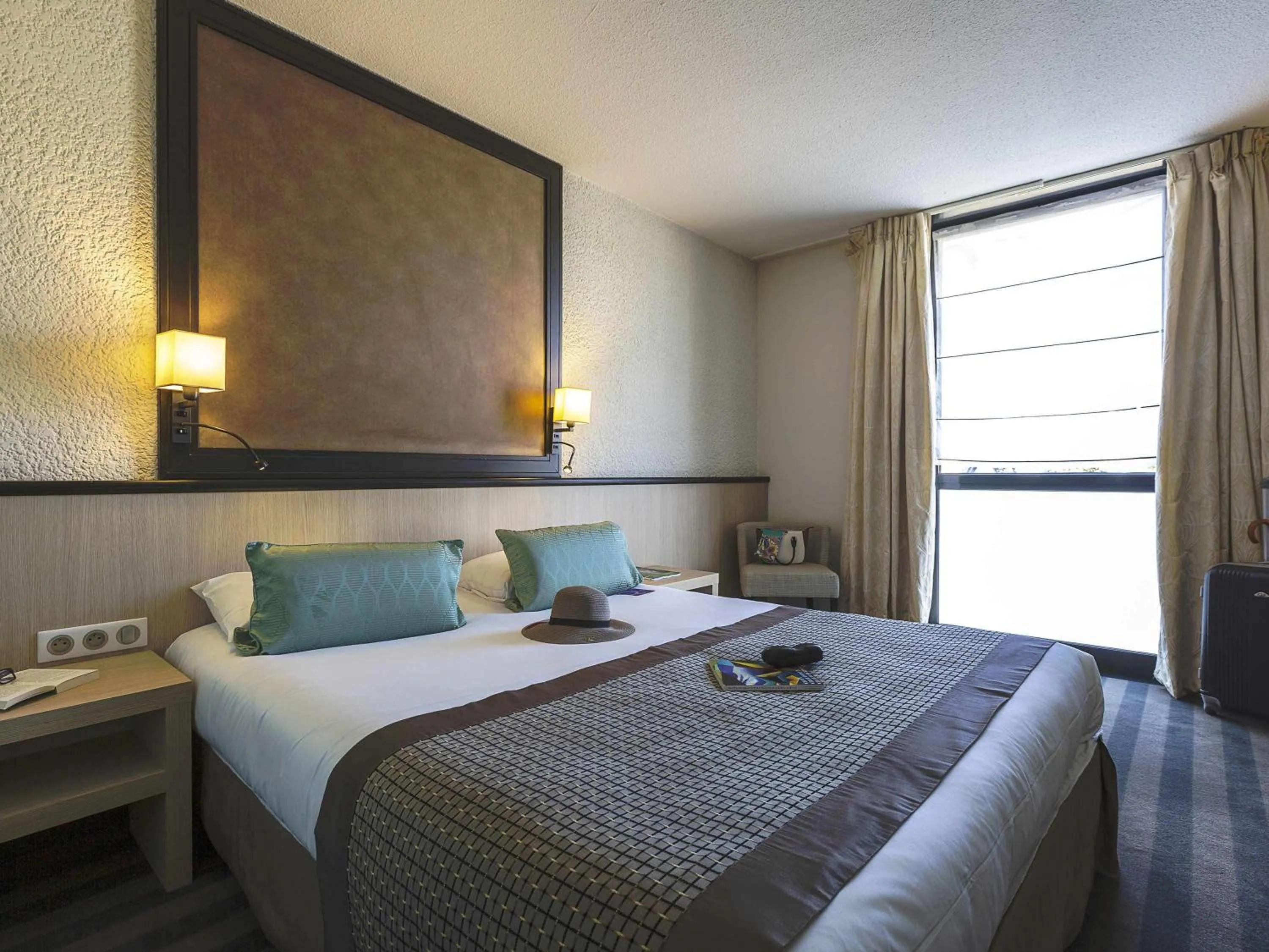 Photo of the whole room, Bed in Mercure Vichy Thermalia