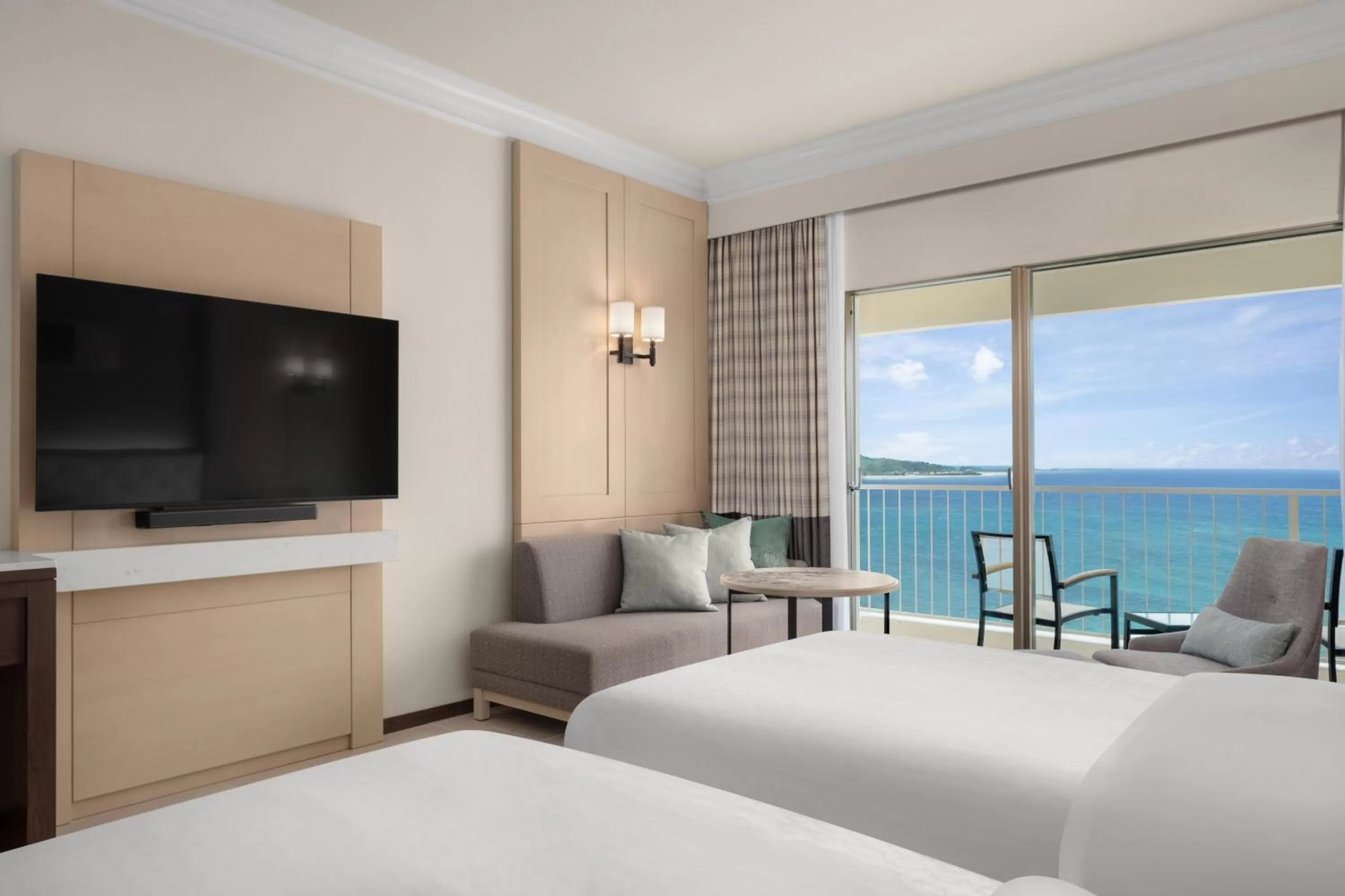 Bed in RIHGA Royal Laguna Guam Resort