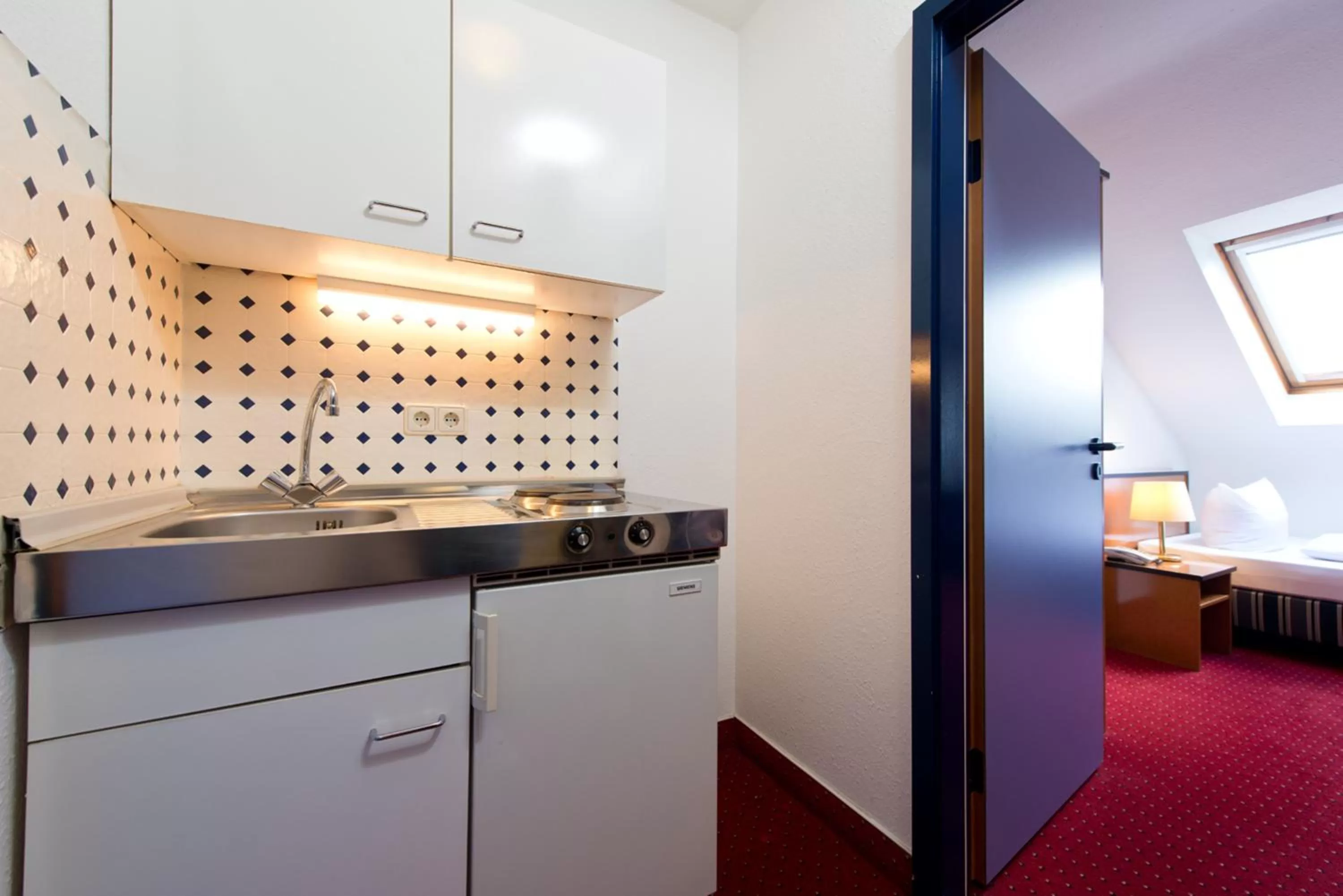 Kitchen or kitchenette in ACHAT Hotel Frankenthal in der Pfalz