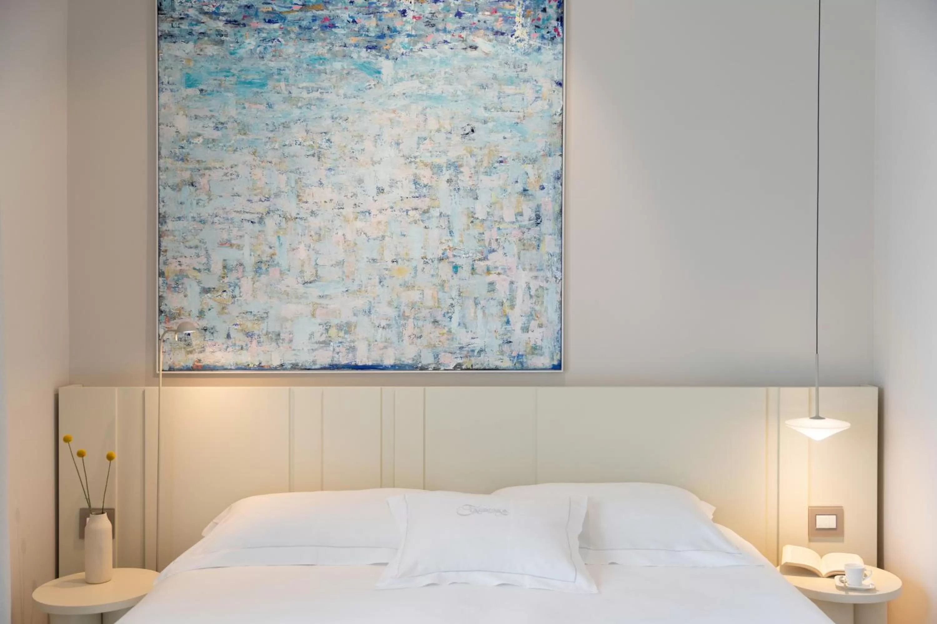 Bed in Taodomus Boutique Hotel