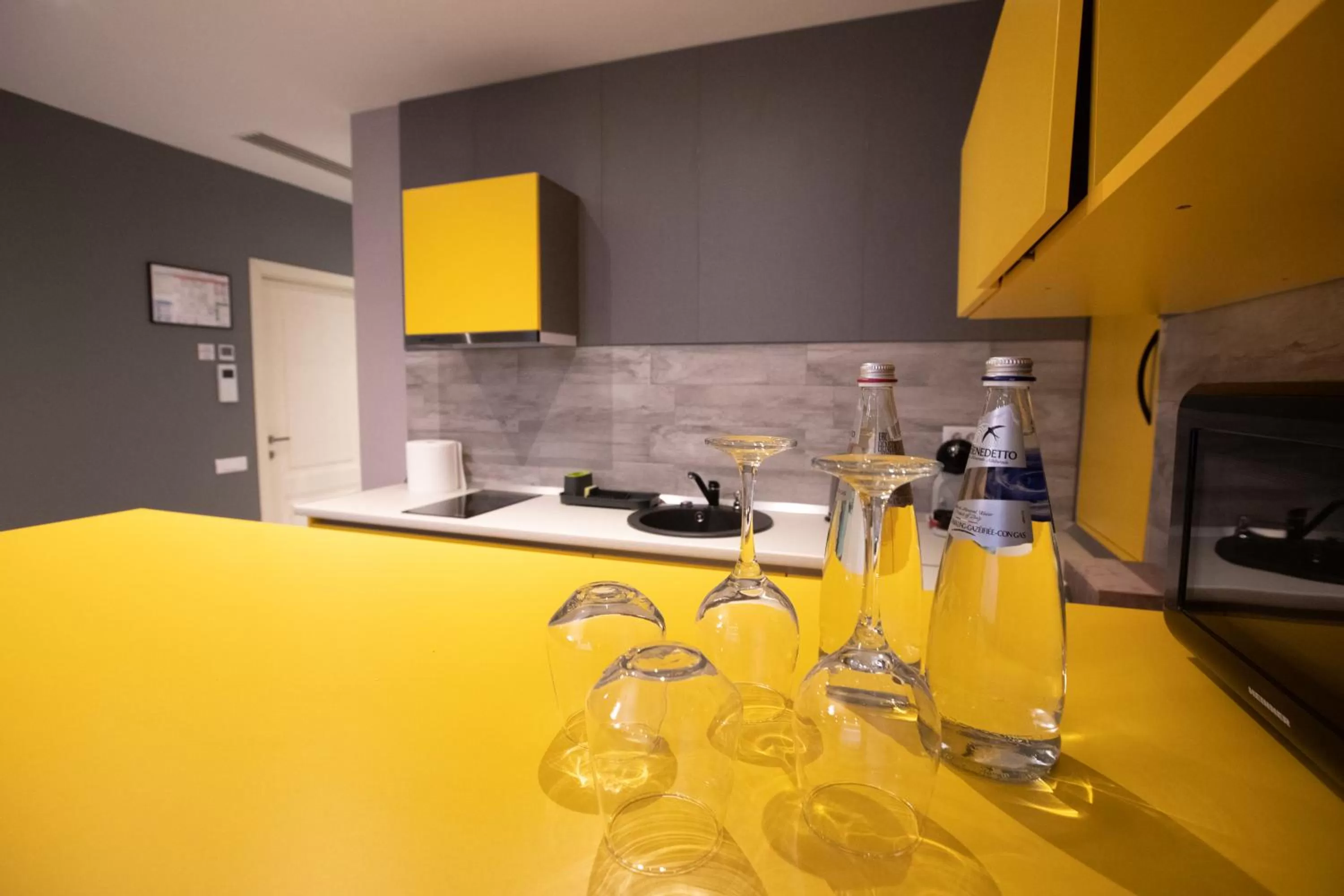 Kitchen or kitchenette in Omnia Apartments