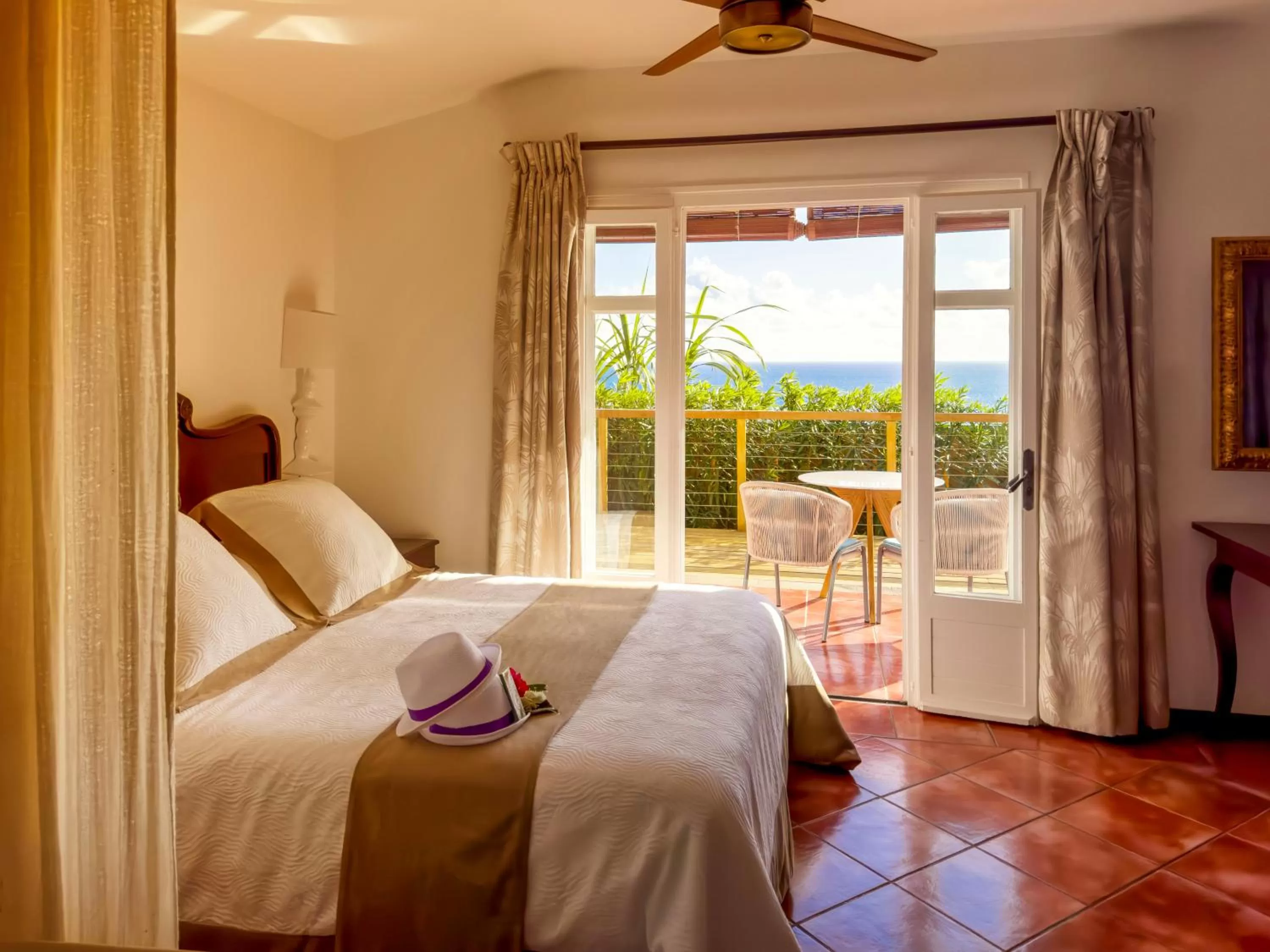 Bed in Blue Margouillat Seaview Hotel-RELAIS & CHATEAUX