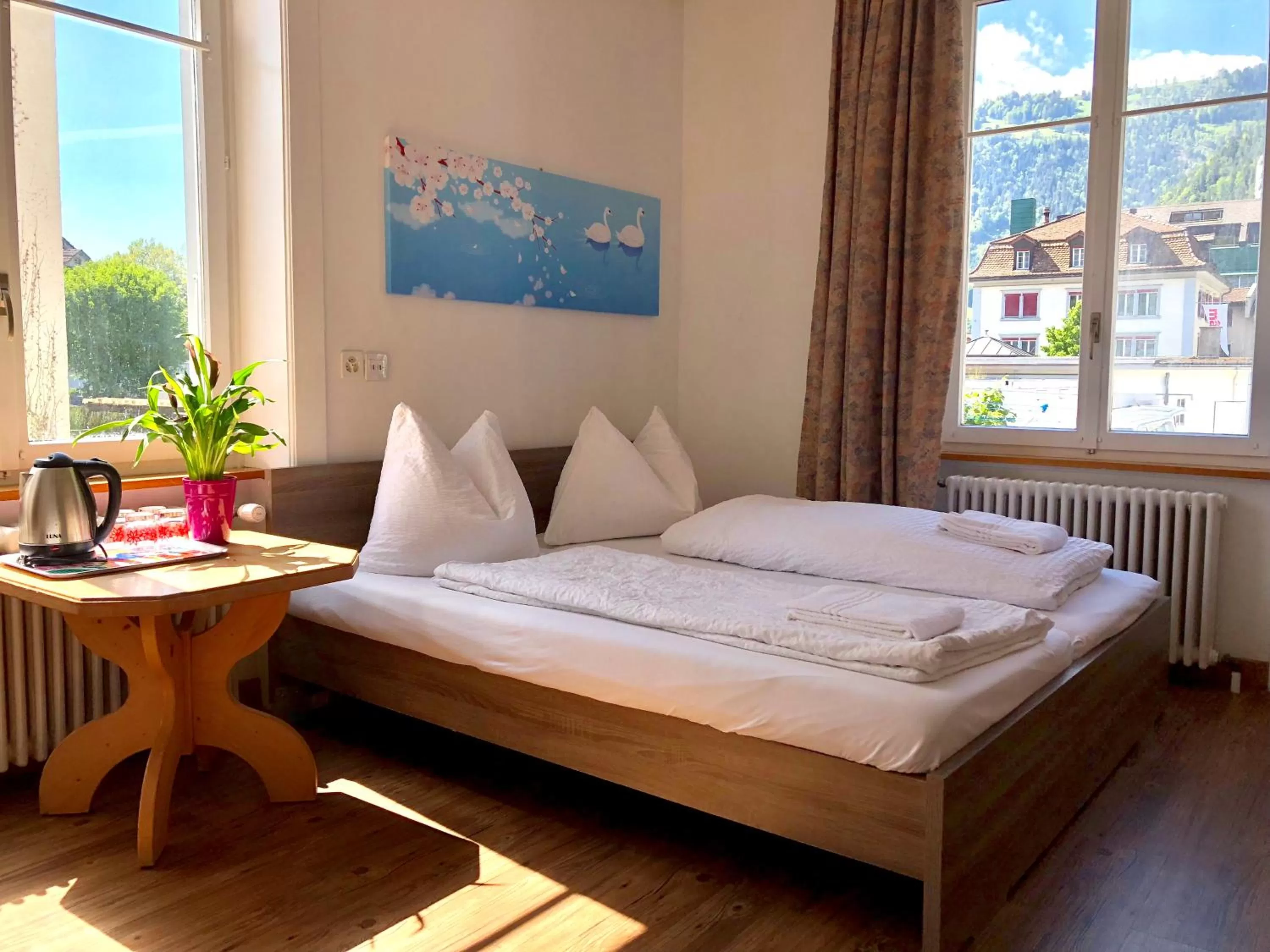 Quadruple Room with Private Bathroom in Interlaken Marco Hostel