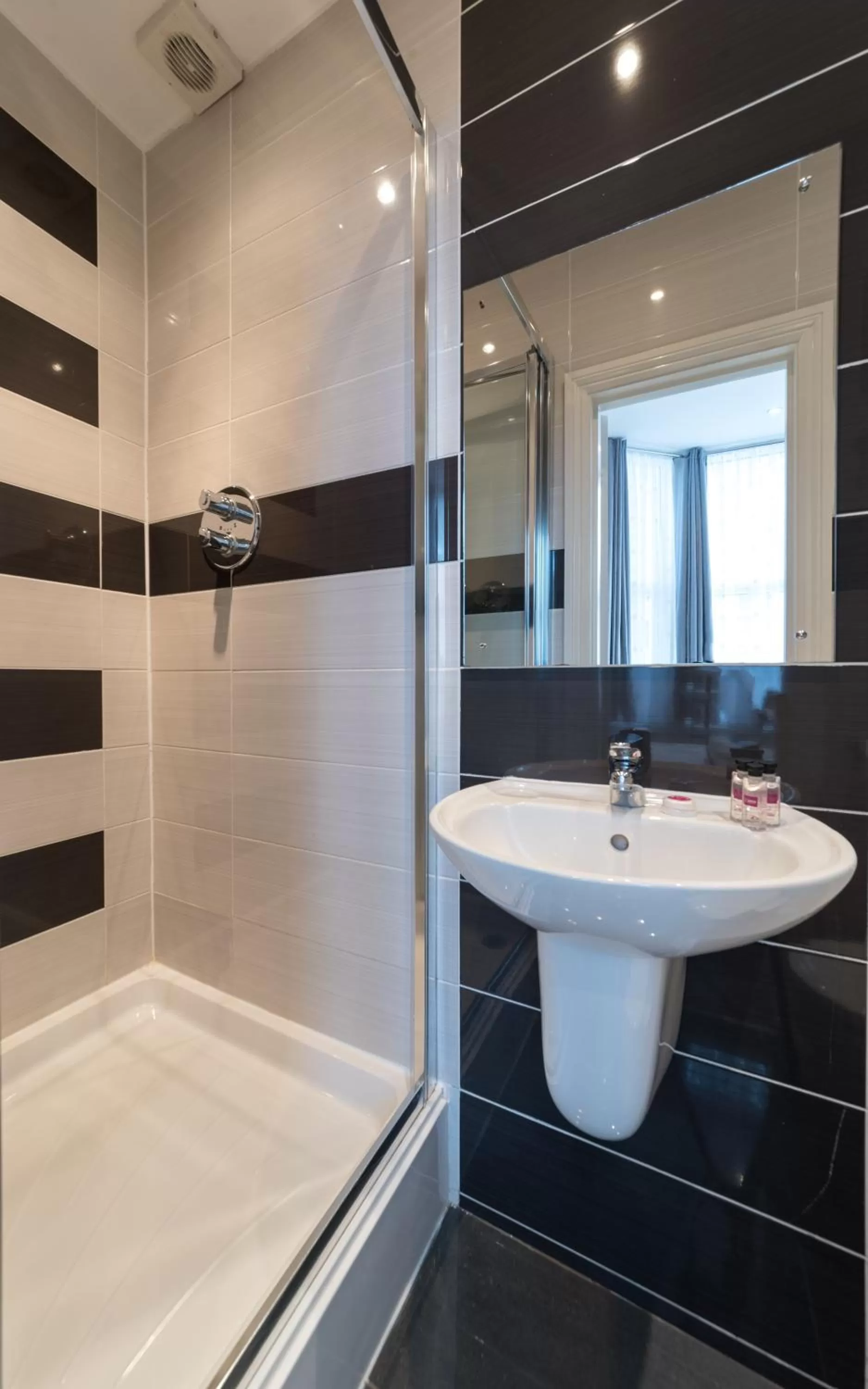 Bathroom in Hellenic Hotel by Saba