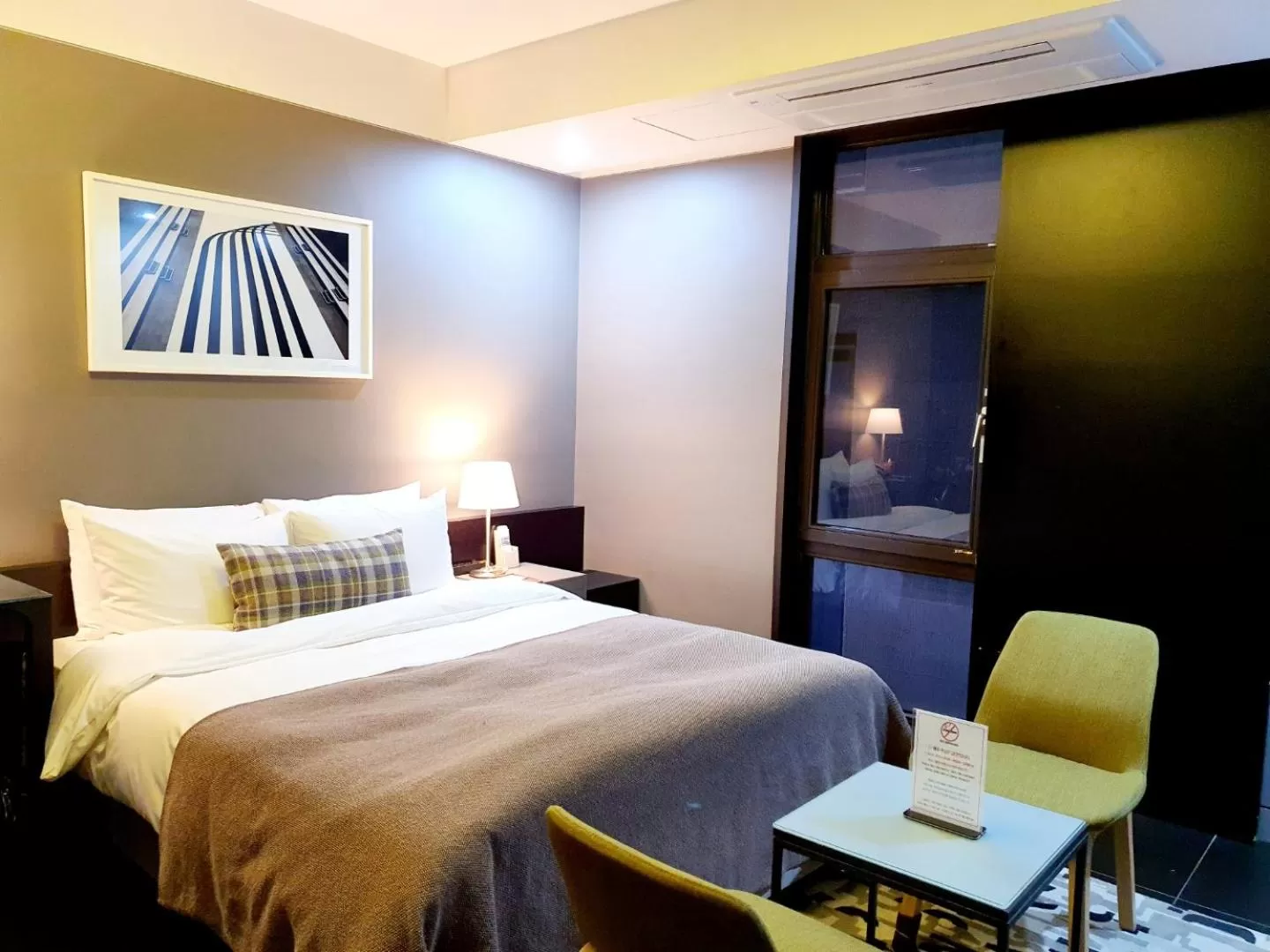 Bed in JS Boutique Hotel