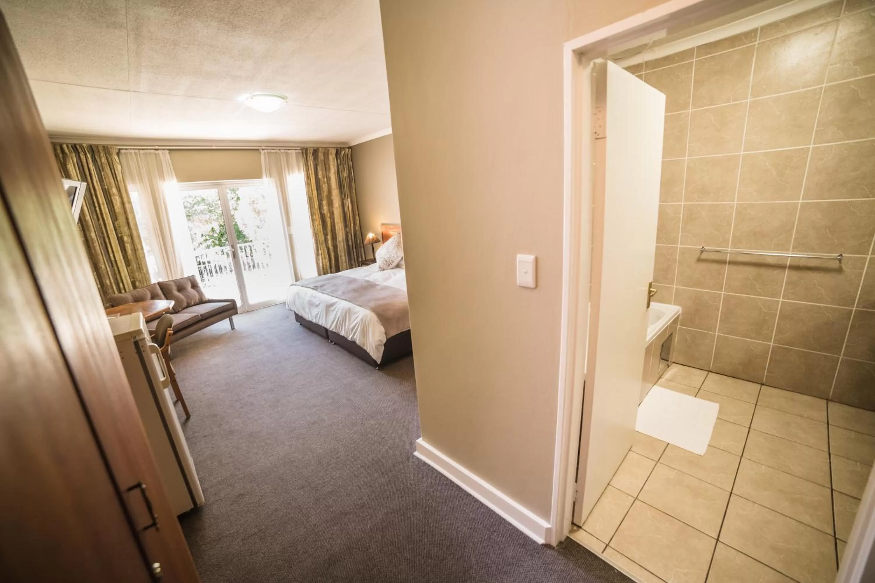 Photo of the whole room, Bed in Acacia Guesthouse Klerksdorp