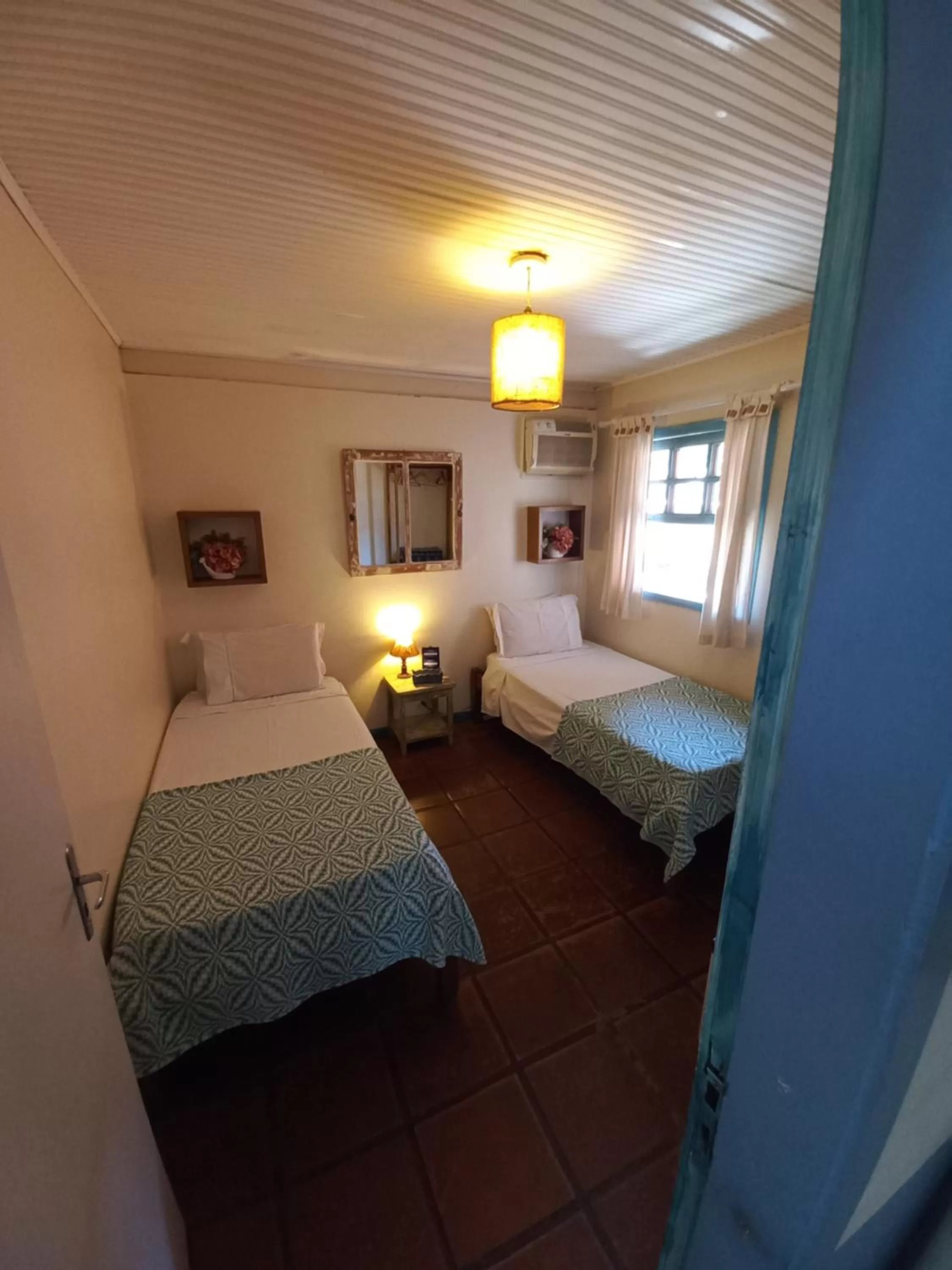 Bed in Pousada L'escale