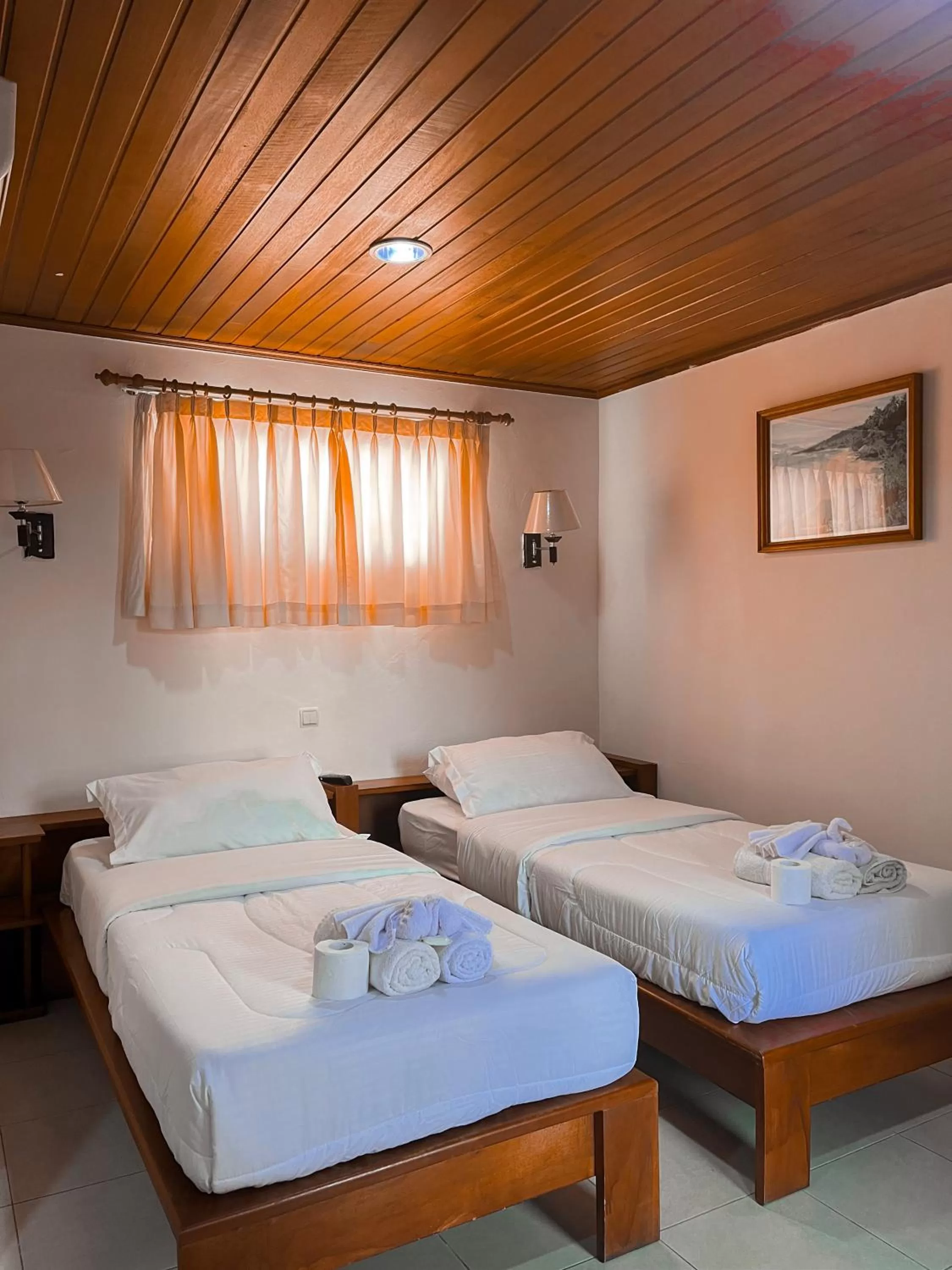 Bed in Arbiru Beach Resort