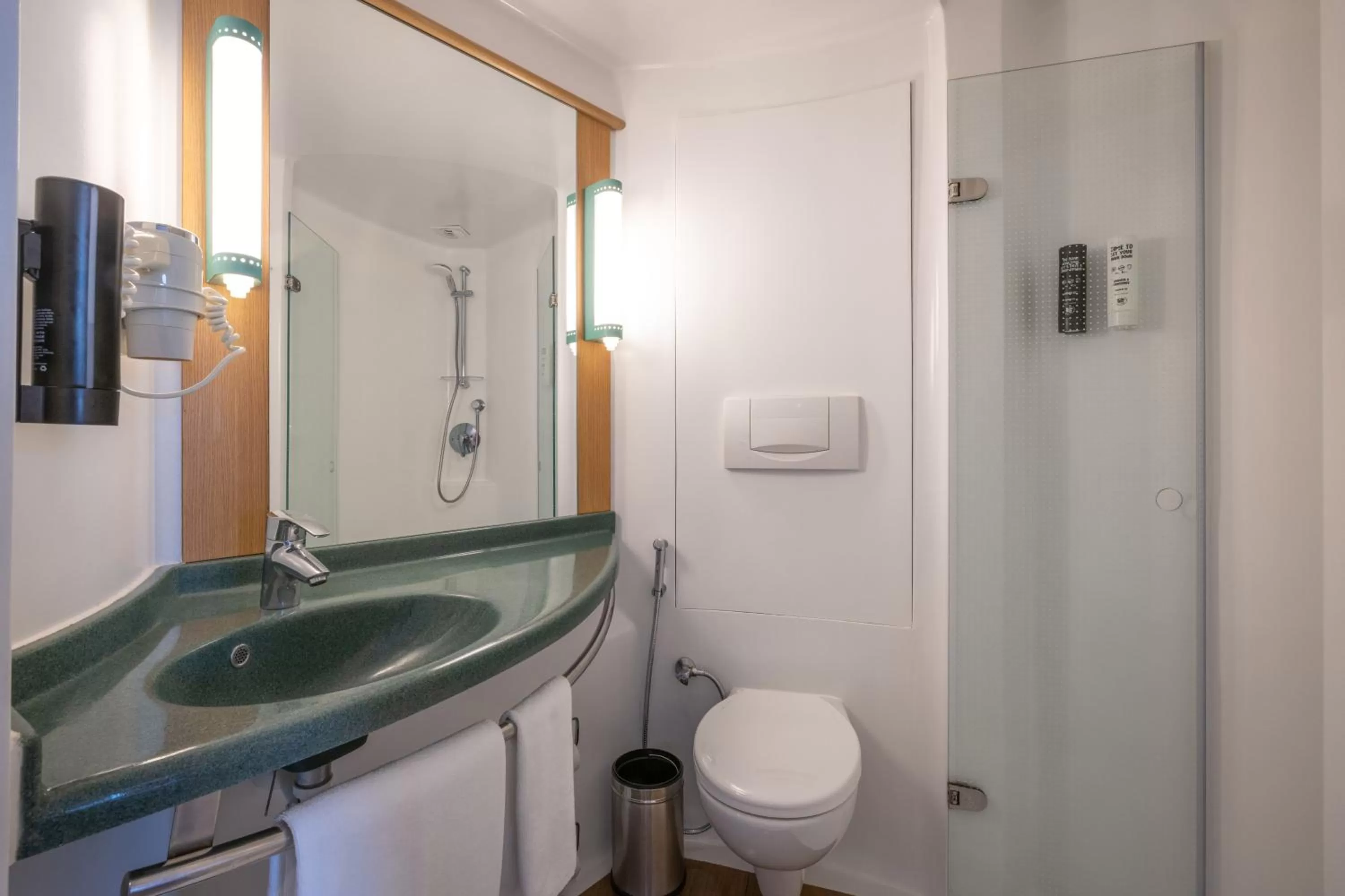 Bathroom in ibis Mumbai Airport - An Accor Brand