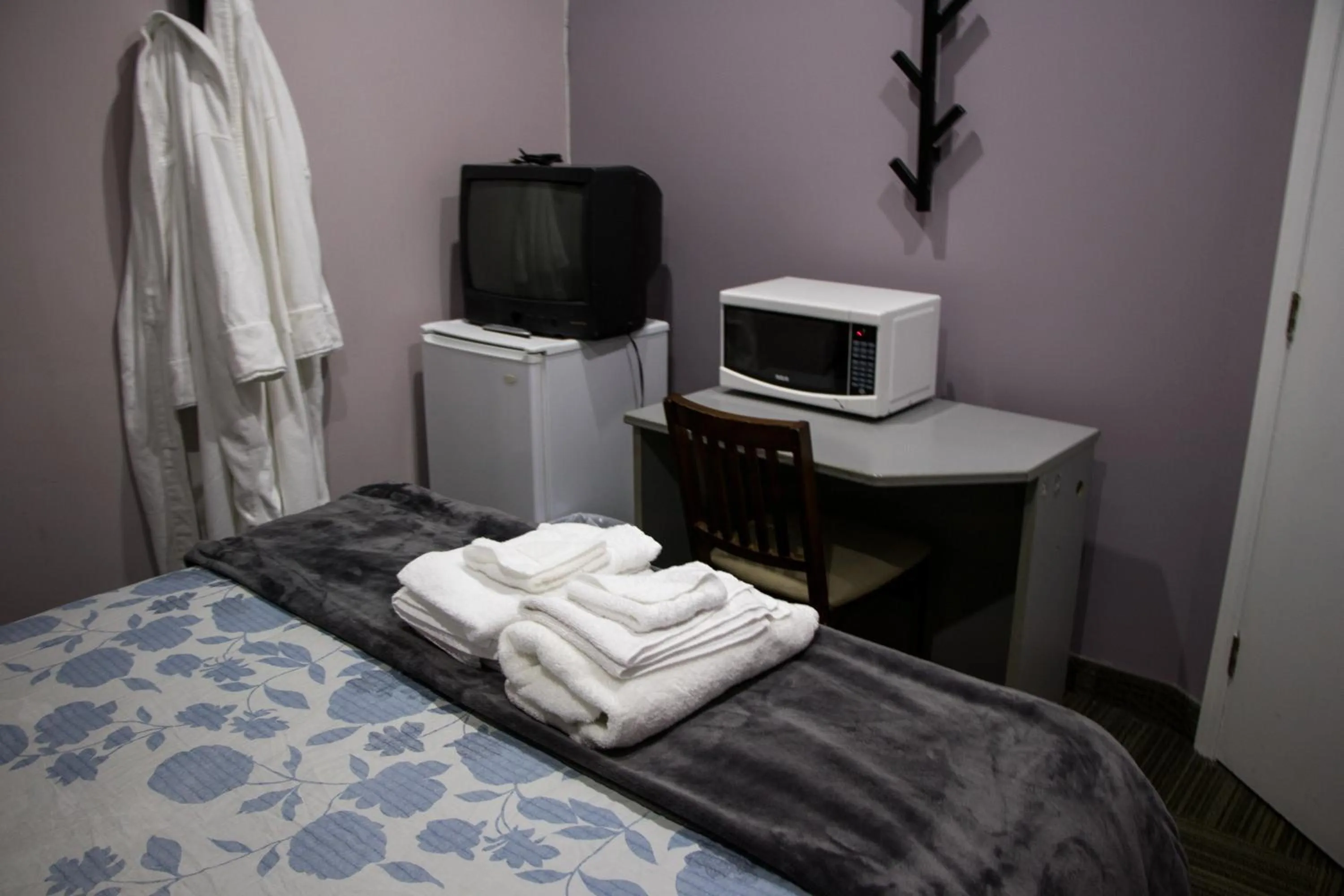 Bed in Saint Lawrence Residences and Suites