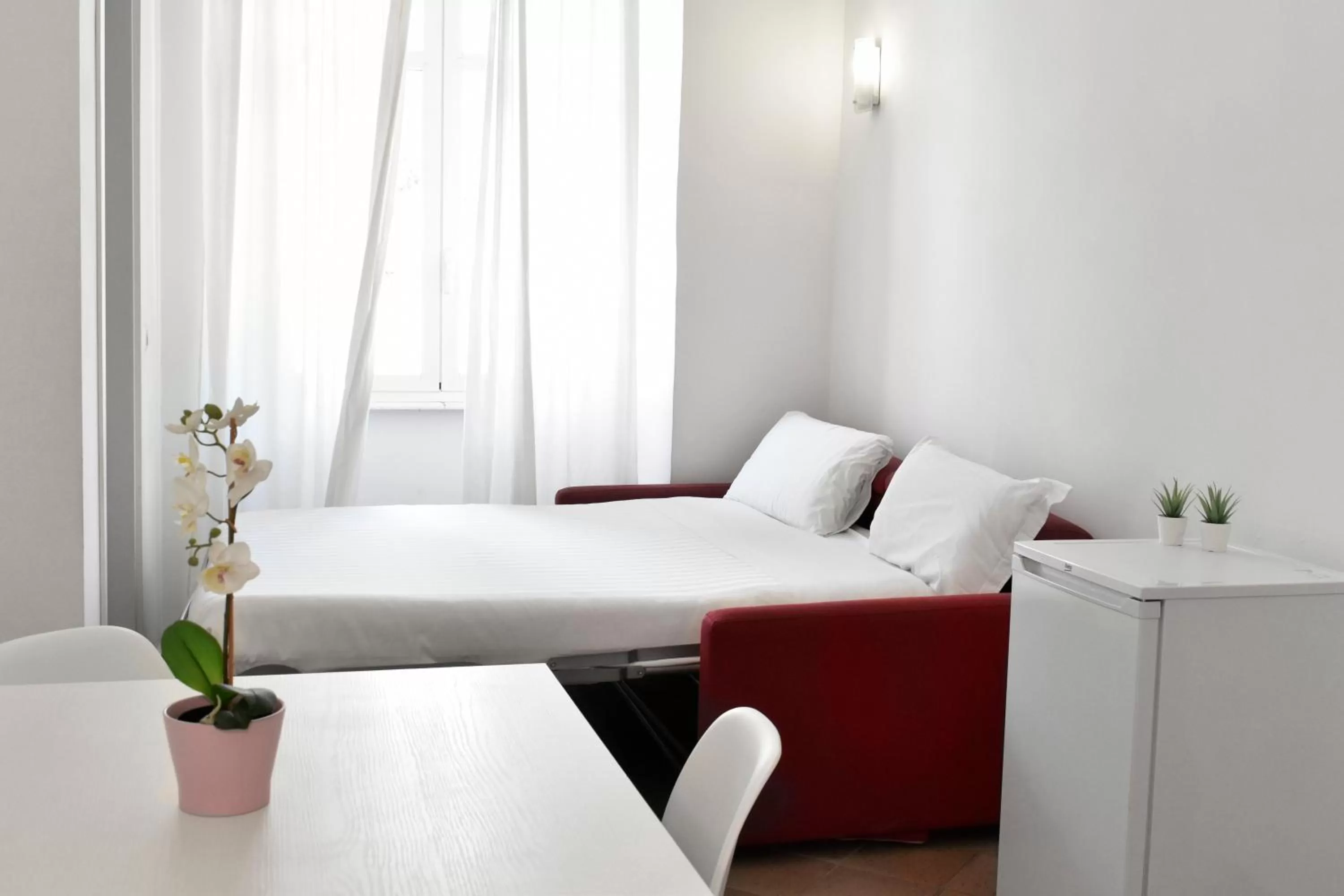 Bed in Roma Resort Colosseum