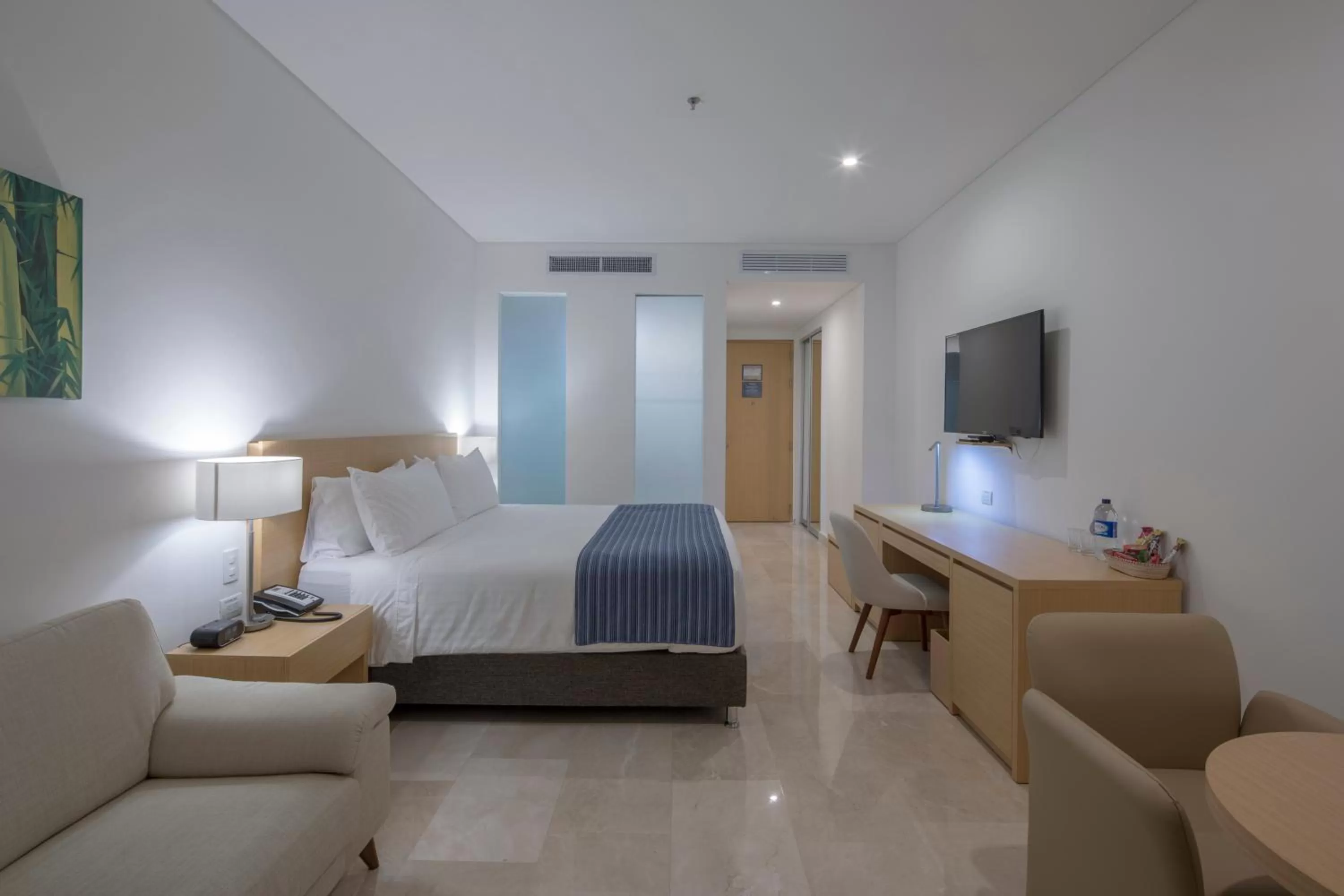 Photo of the whole room, Bed in Hotel Dann Carlton Barranquilla y Centro de Convenciones