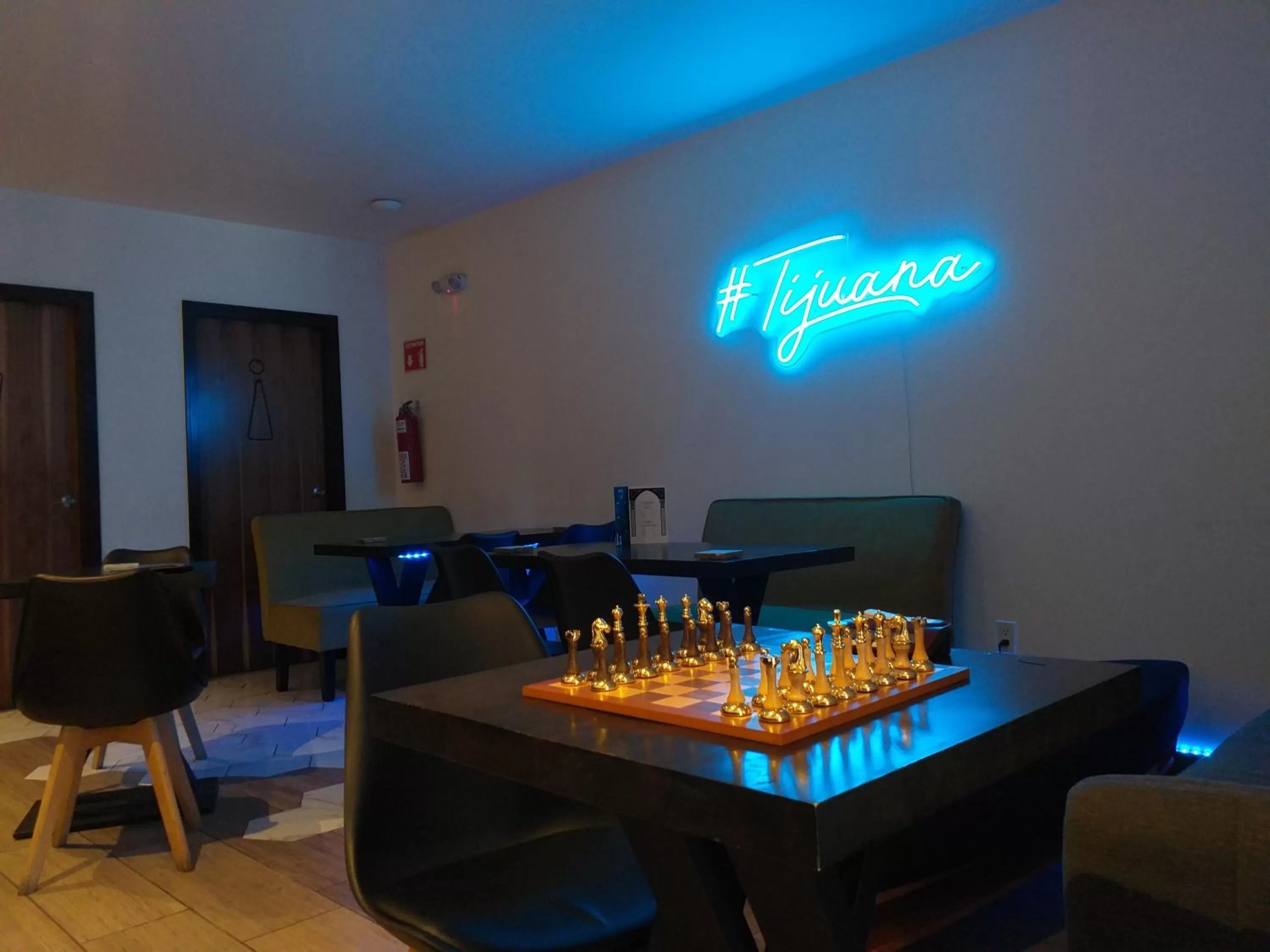 Communal lounge/ TV room in Alou Hotel Boutique