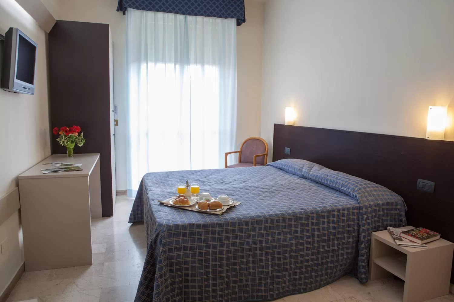 Bed in AUTO PARK Hotel