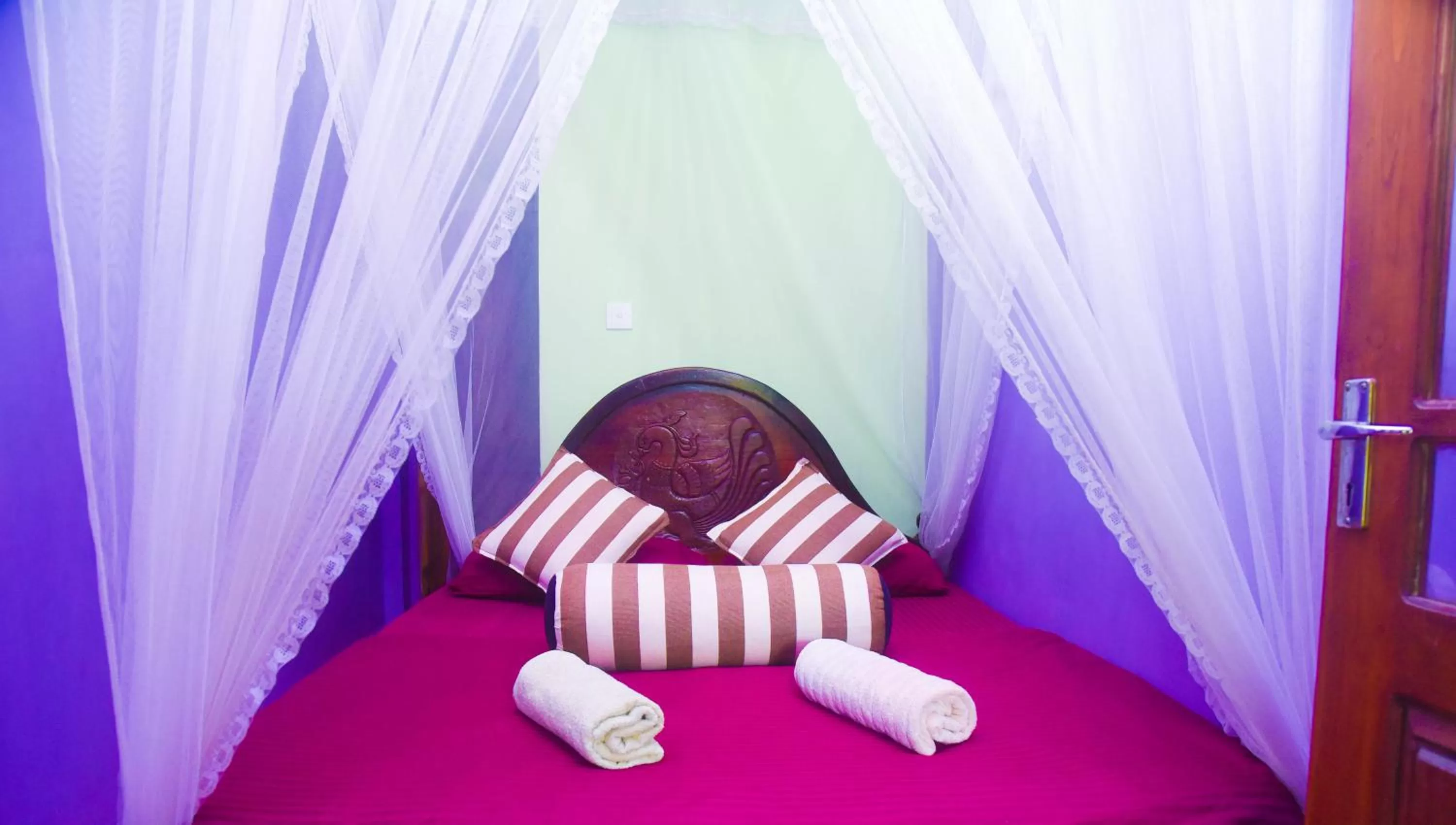 Bed in Madushanka Resort