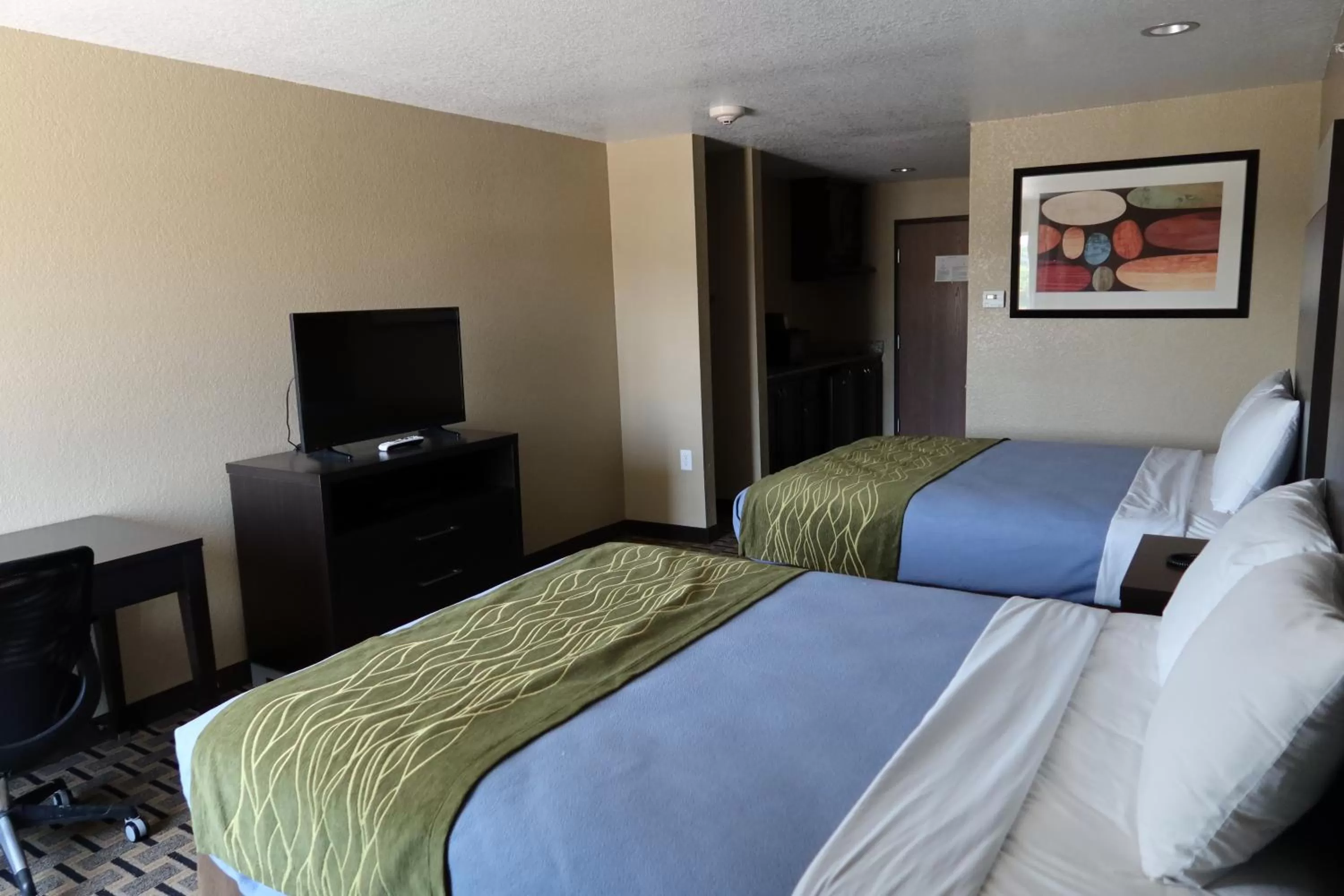 Bed in West Worth Inn & Suites White Settlement