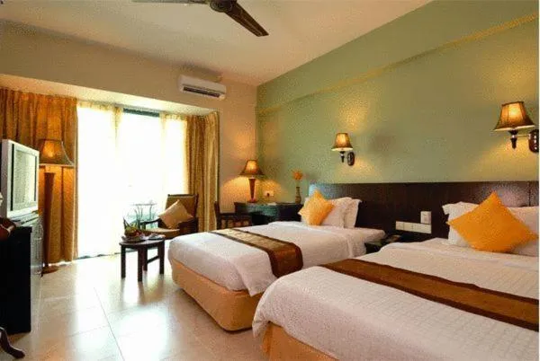 Bed in Beringgis Beach Resort & Spa