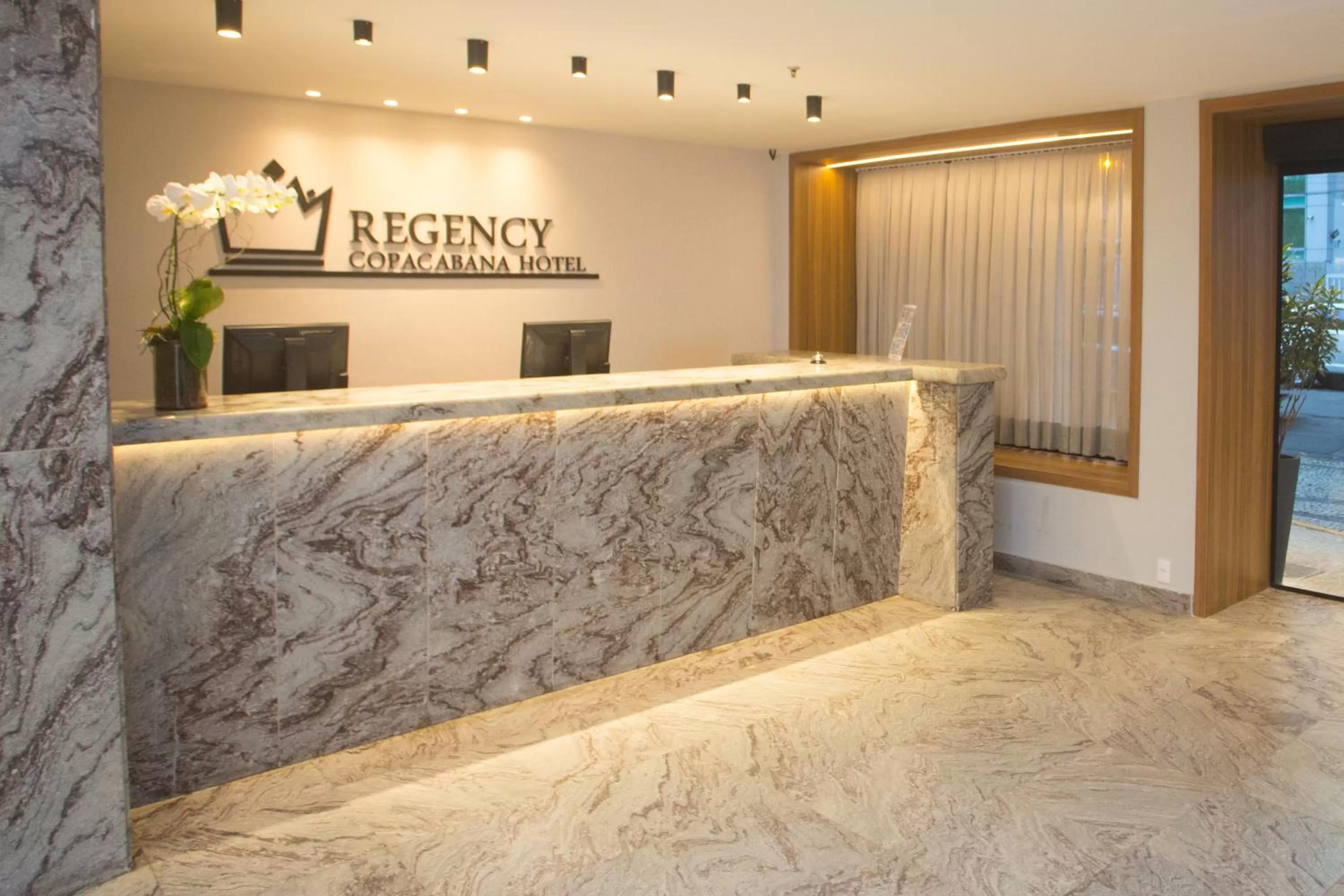Lobby or reception in Regency Copacabana Hotel