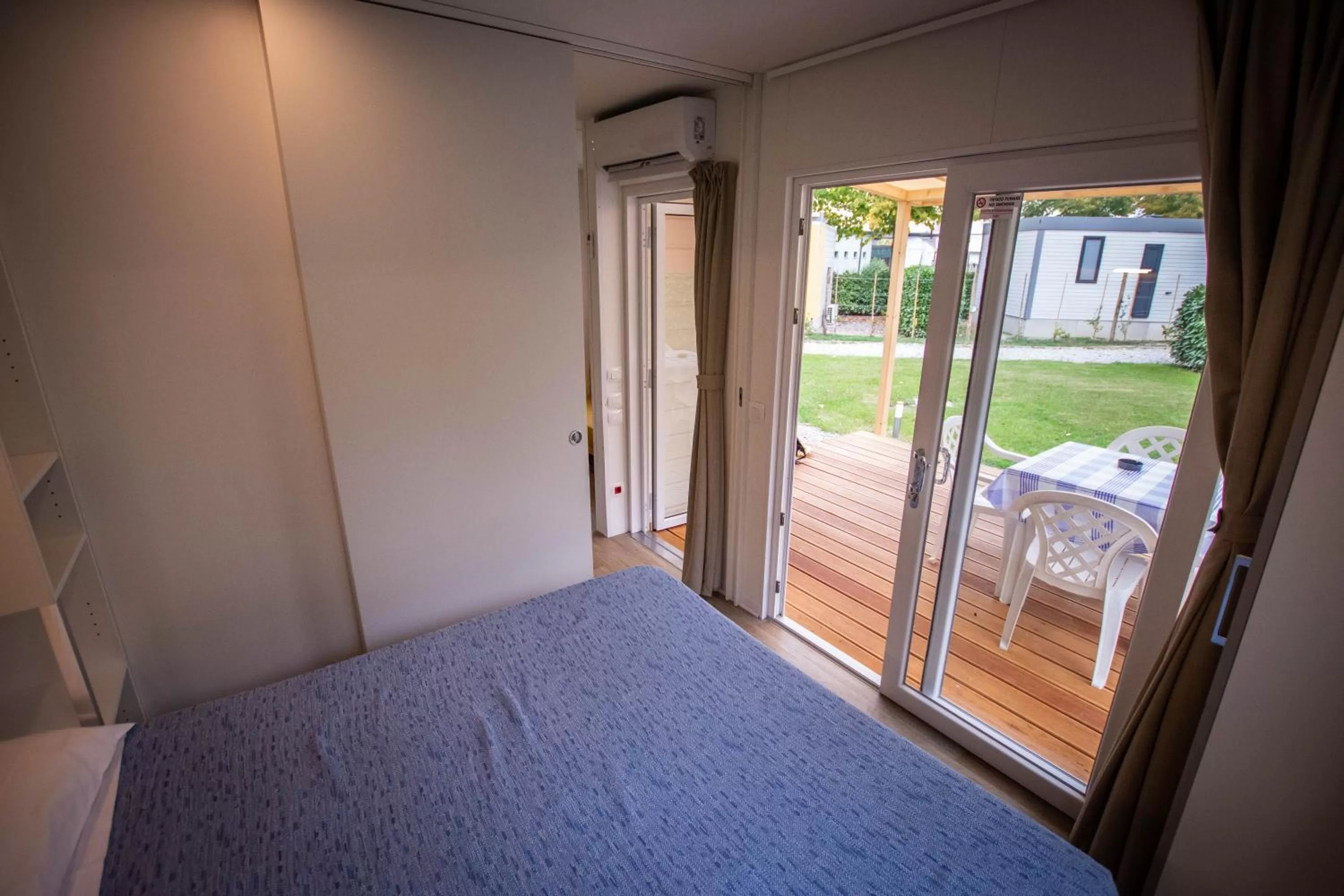 Bed in Albavillage Rooms & Camping