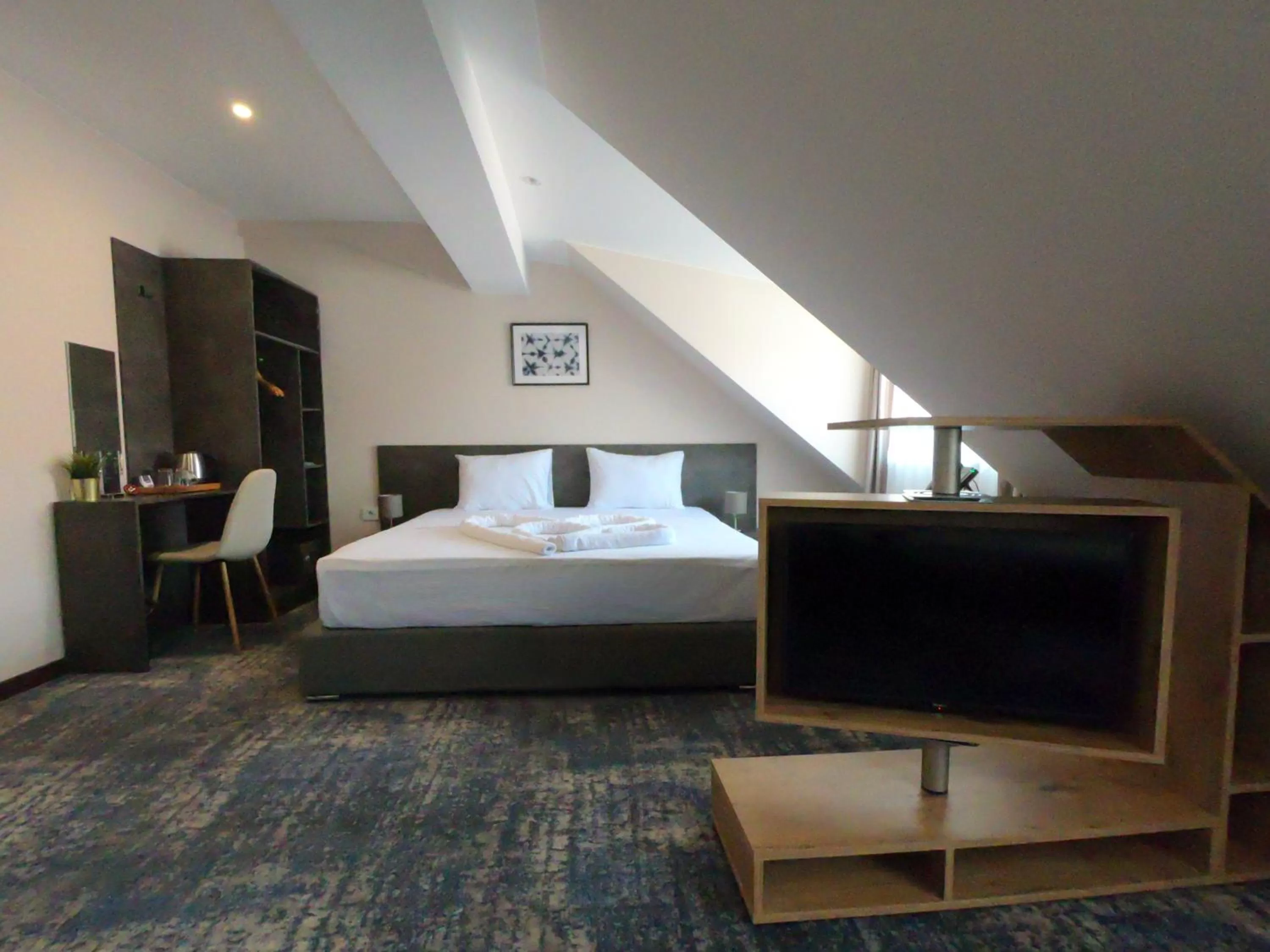 Deluxe Double Room (2 Adults + 1 Child) in Hotel Premium