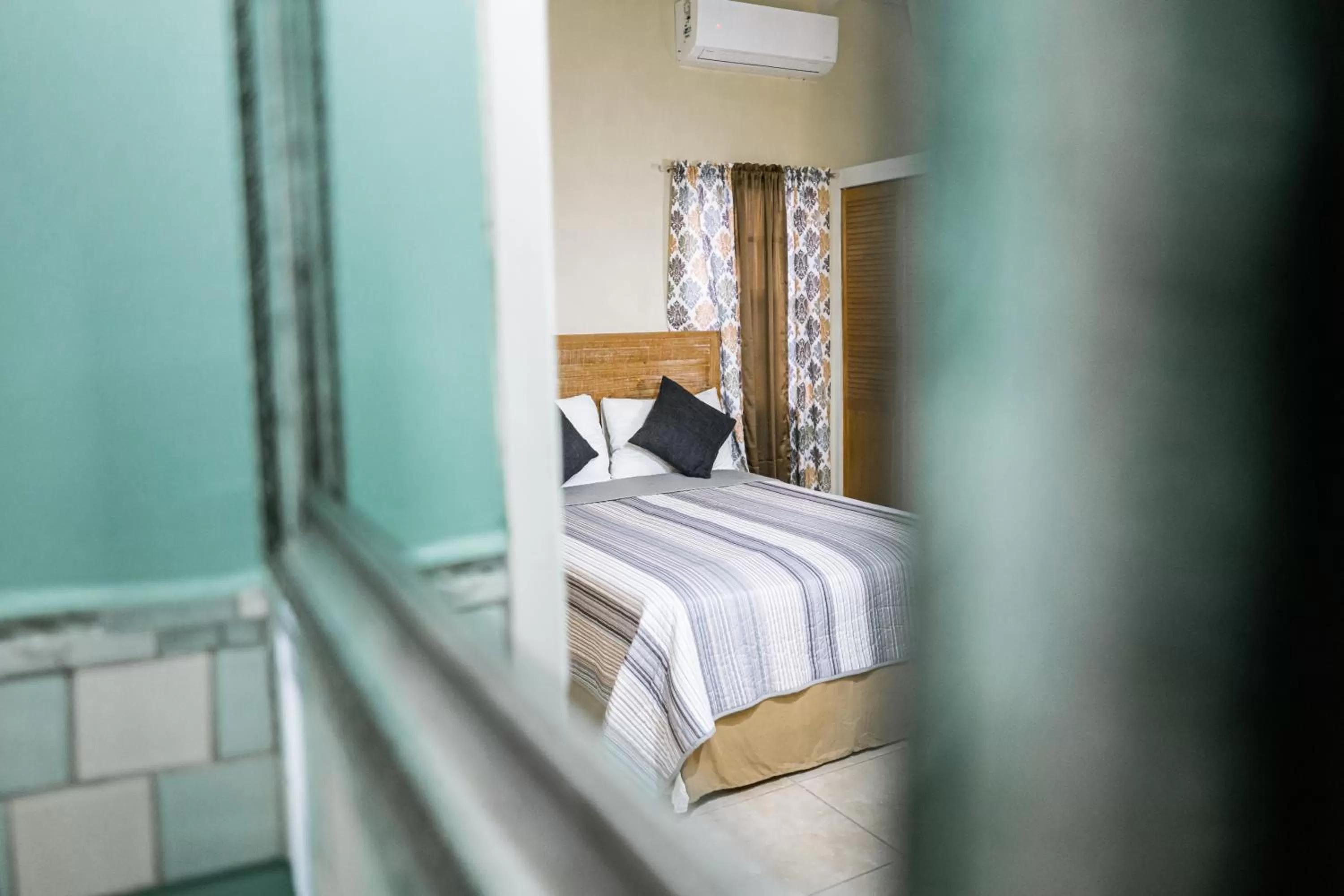 Bed in Connie's Comfort Suites