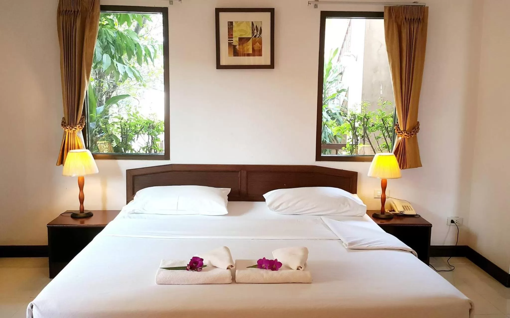 Bed in Areena Resort and Hotel Uttaradit