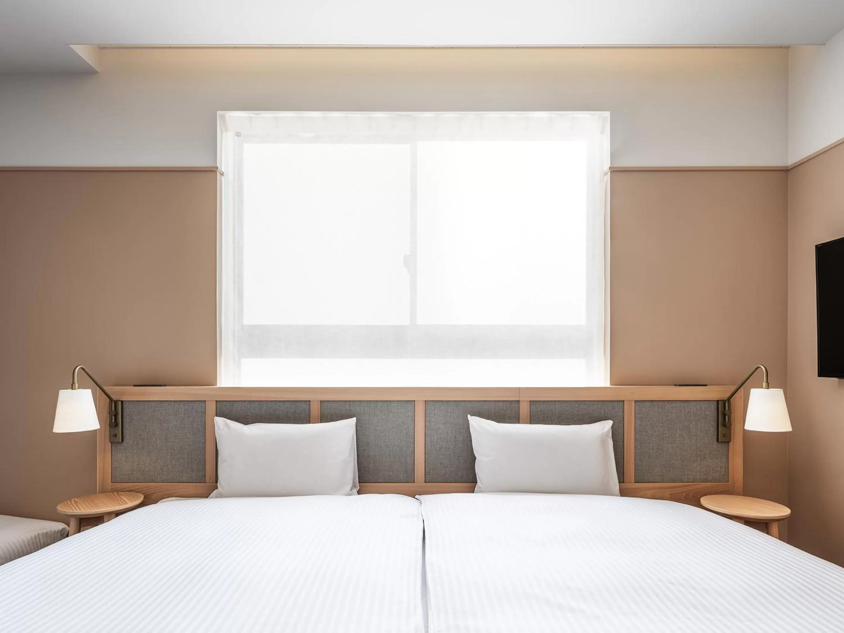 Photo of the whole room, Bed in RAKURO Kyoto by THE SHARE HOTELS