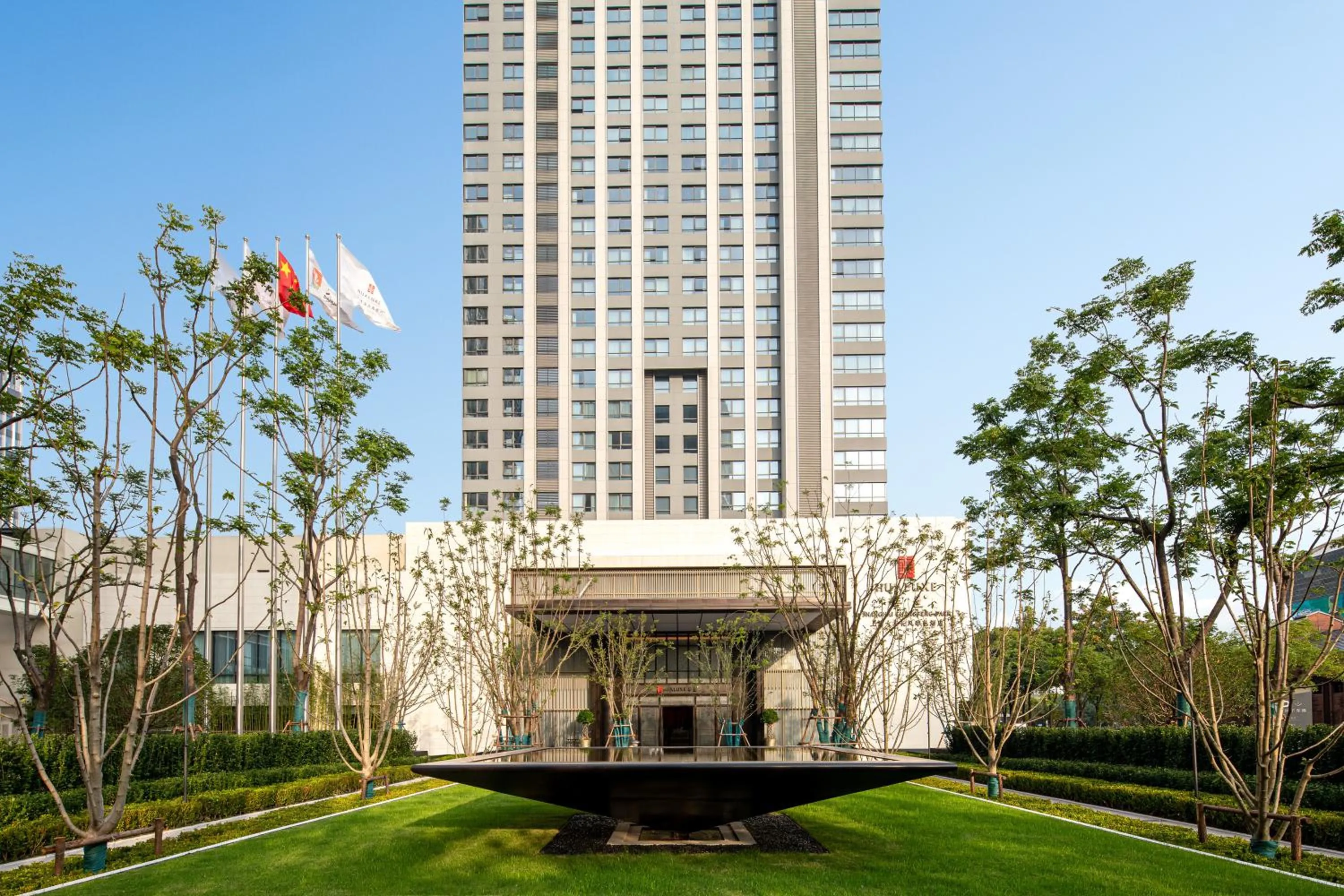 Property building in HUALUXE Shanghai Changfeng Park by IHG