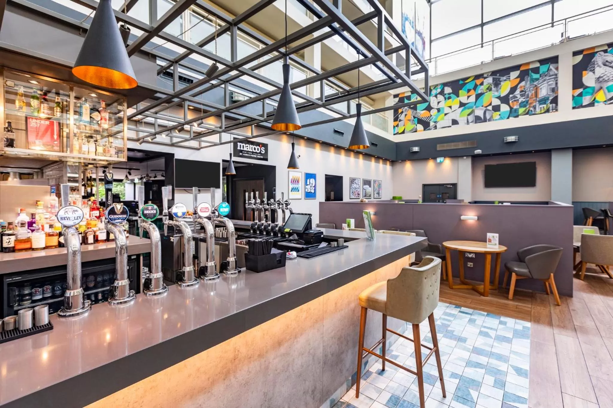 Lounge or bar in Holiday Inn Milton Keynes Central by IHG