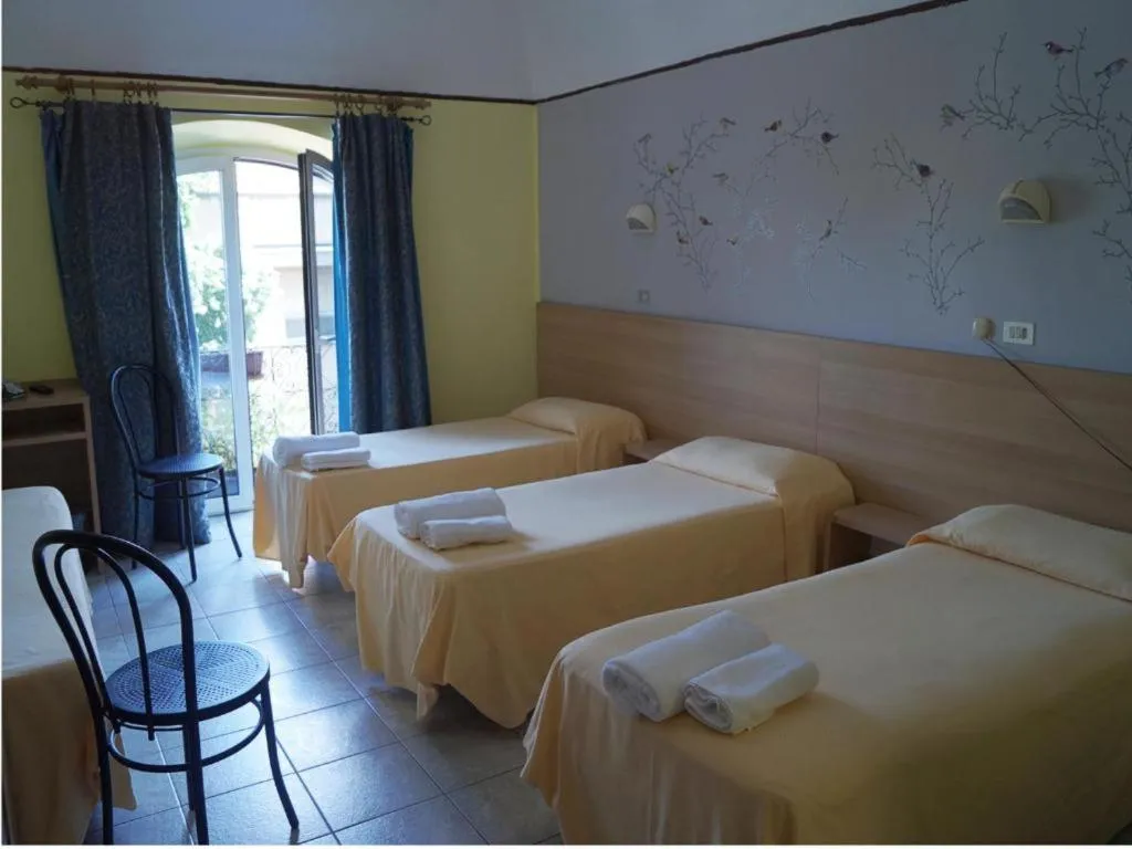 Bed in Hotel Stazione