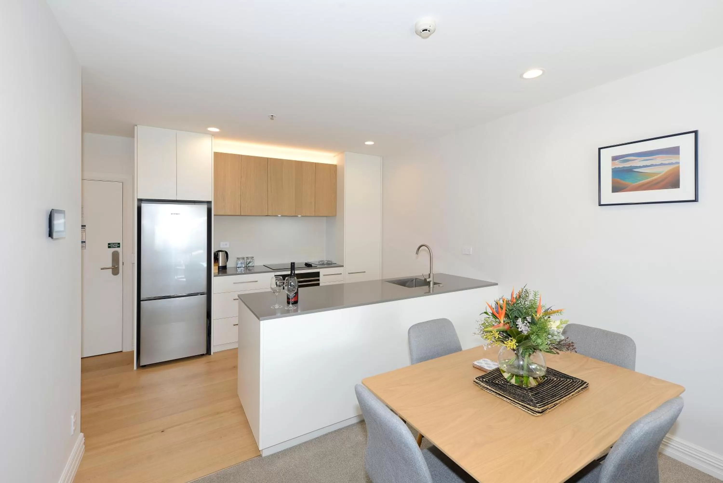 Kitchen or kitchenette in West Fitzroy Apartments