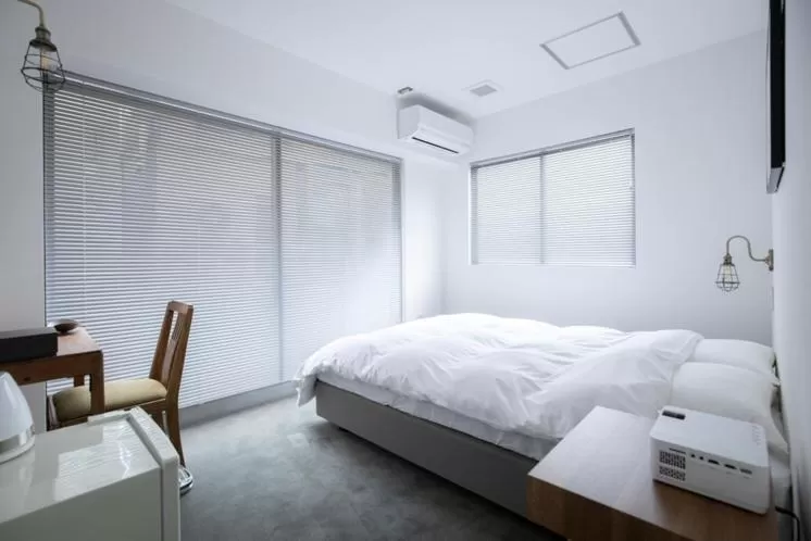 Bed in BENJAMIN HOTEL KANAZAWA