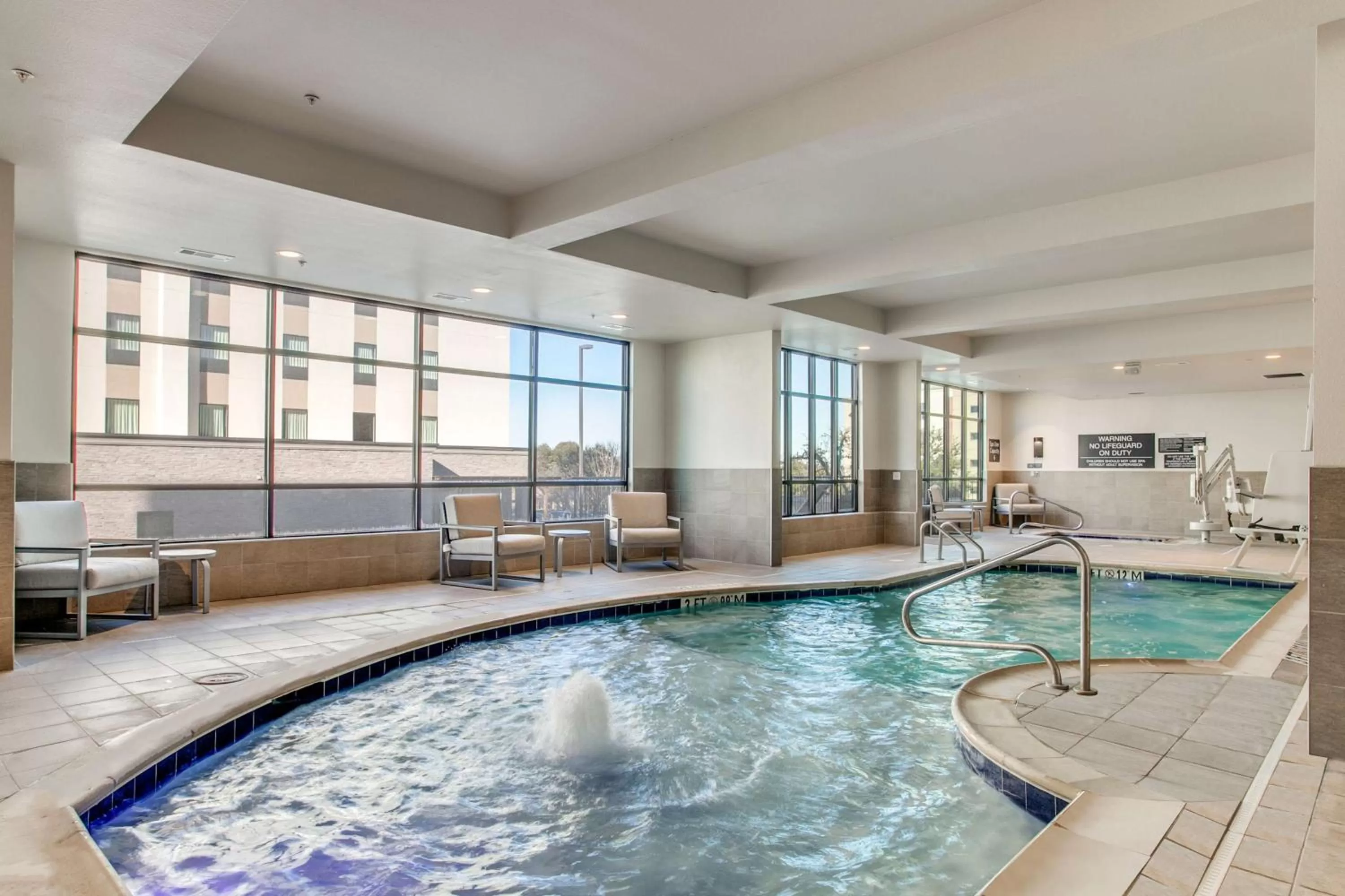 Pool view in Hilton Garden Inn Dallas-Central Expy/North Park Area, Tx