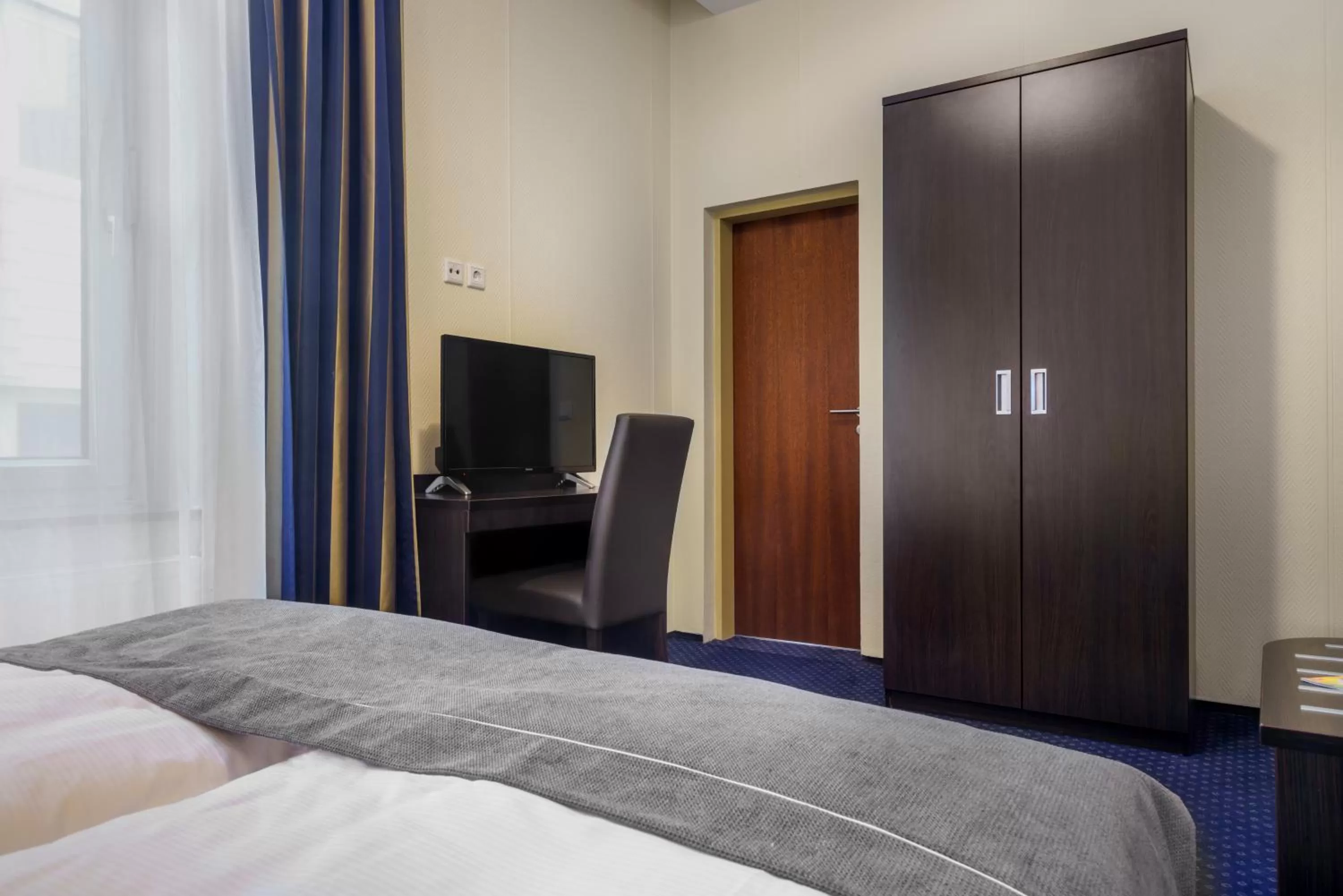 Bed in Hotel Continental Hamburg Hauptbahnhof