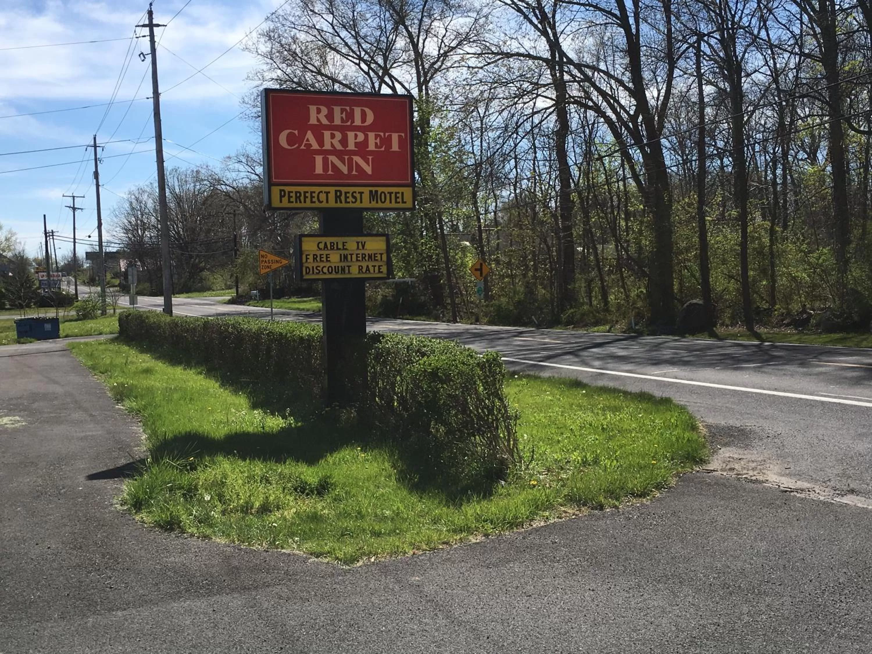 Property logo or sign in Red Carpet Inn - Gettysburg